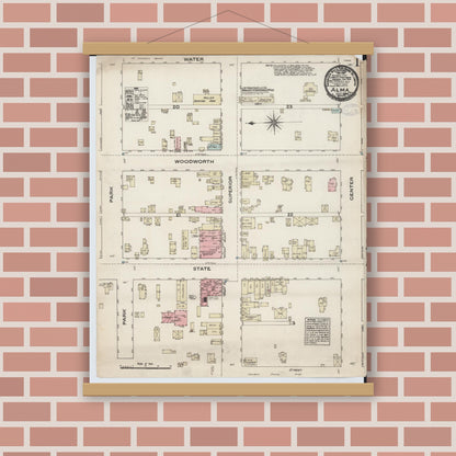 Old map wall art mockup — magnetic wood frame on brick wall — Sanborn Fire Insurance Map from Alma, Gratiot County, Michigan (1884) - Complete Map Set
