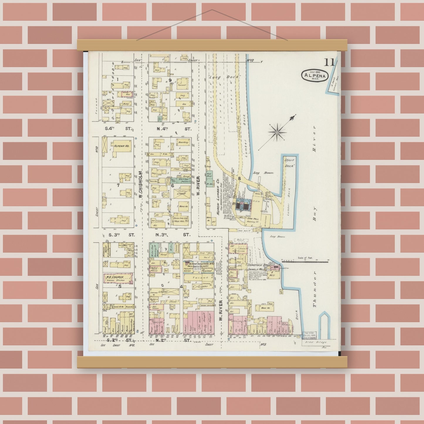 Old map wall art mockup — magnetic wood frame on brick wall — Sanborn Fire Insurance Map from Alpena, Alpena County, Michigan (1890), Sheet #0011