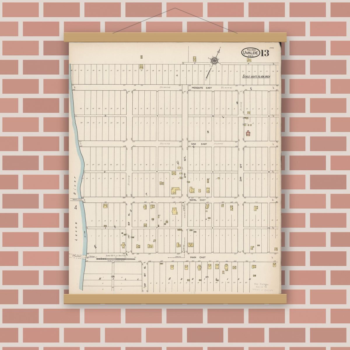 Old map wall art mockup — magnetic wood frame on brick wall — Sanborn Fire Insurance Map from Uvalde, Uvalde County, Texas (1922), Sheet #0013