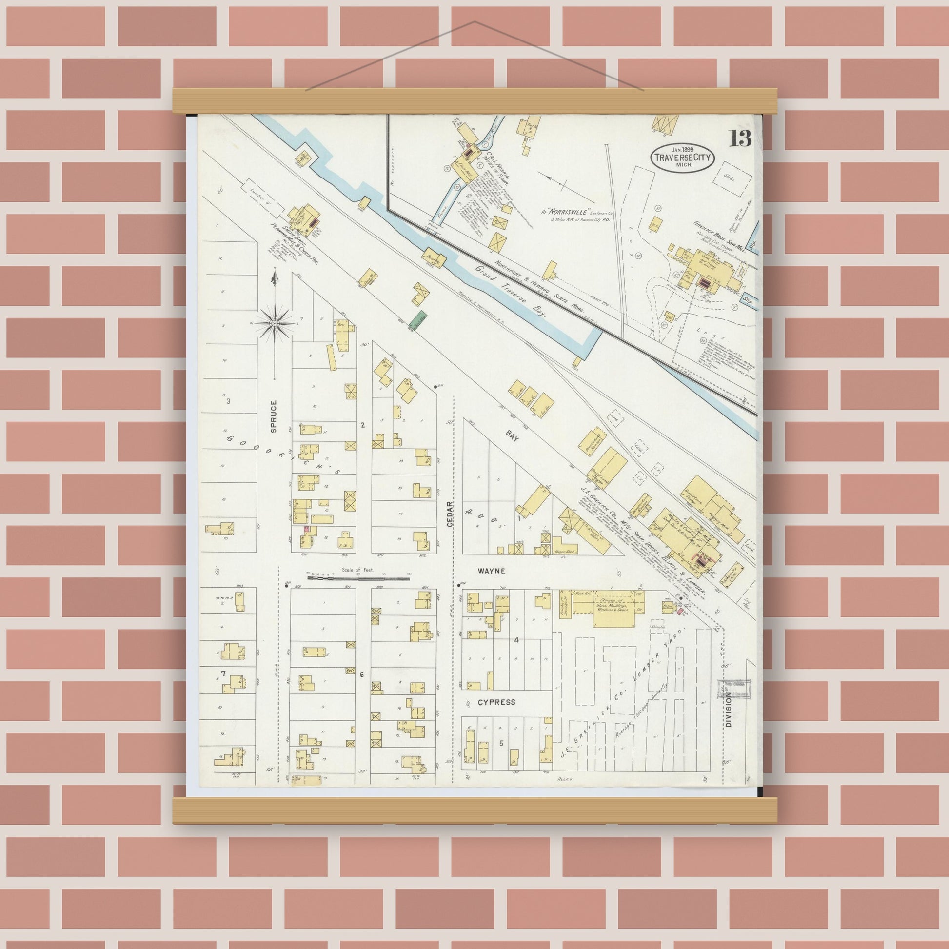 Old map wall art mockup — magnetic wood frame on brick wall — Sanborn Fire Insurance Map from Traverse City, Grand Traverse County, Michigan (1899), Sheet #0013