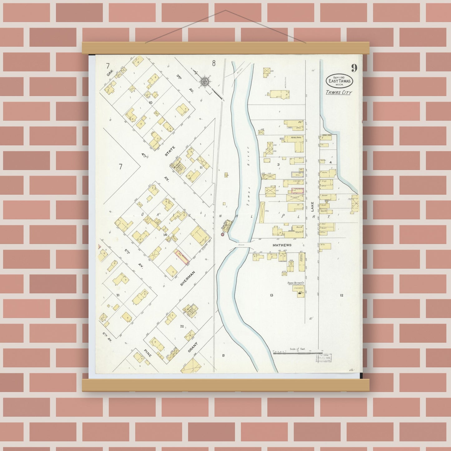Old map wall art mockup — magnetic wood frame on brick wall — Sanborn Fire Insurance Map from East Tawas, Iosco County, Michigan (1910), Sheet #0009