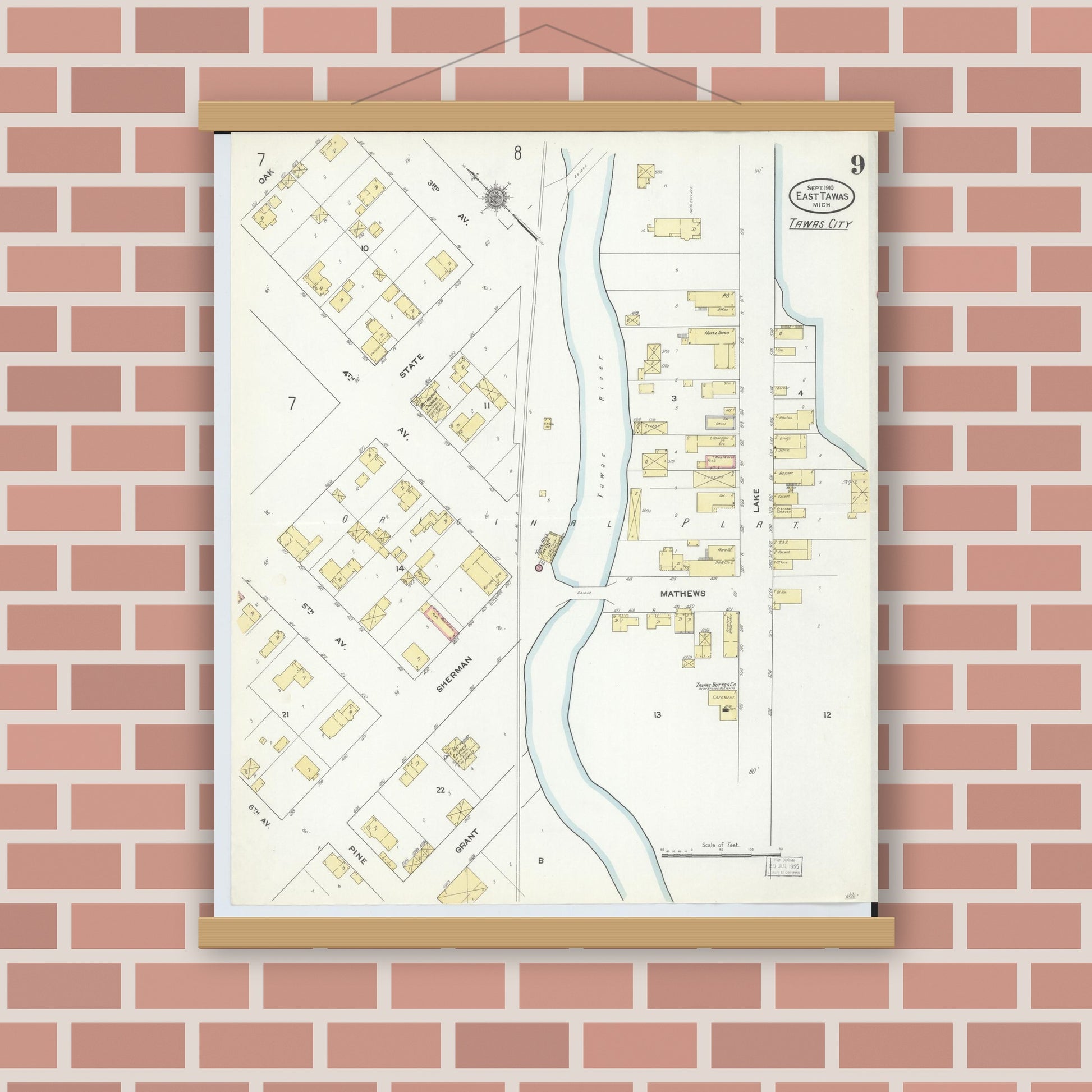 Old map wall art mockup — magnetic wood frame on brick wall — Sanborn Fire Insurance Map from East Tawas, Iosco County, Michigan (1910), Sheet #0009