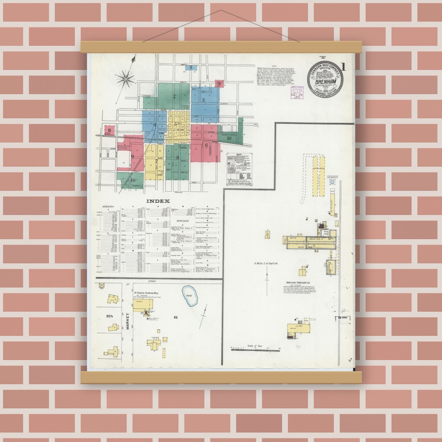 Old map wall art mockup — magnetic wood frame on brick wall — Sanborn Fire Insurance Map from Brenham, Washington County, Texas (1906), Sheet #0001