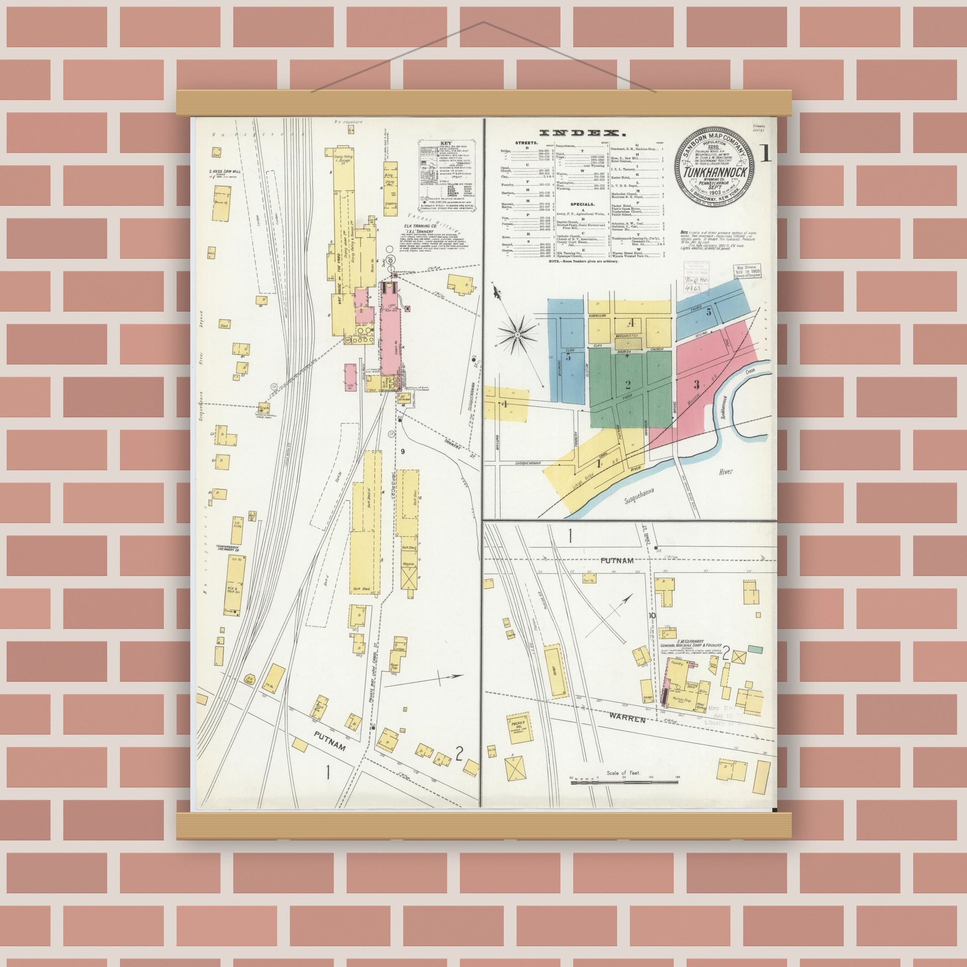 Old map wall art mockup — magnetic wood frame on brick wall — Sanborn Fire Insurance Map from Tunkhannock, Wyoming County, Pennsylvania (1903), Sheet #0001