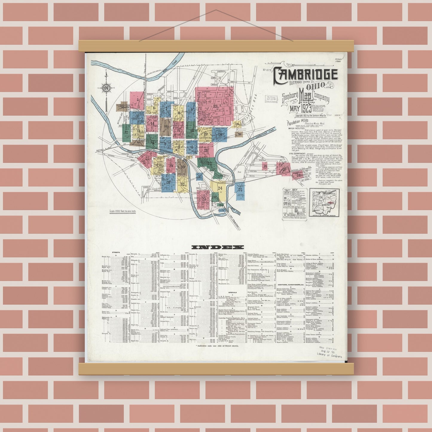 Old map wall art mockup — magnetic wood frame on brick wall — Sanborn Fire Insurance Map from Cambridge, Guernsey County, Ohio (1923), Sheet #0001