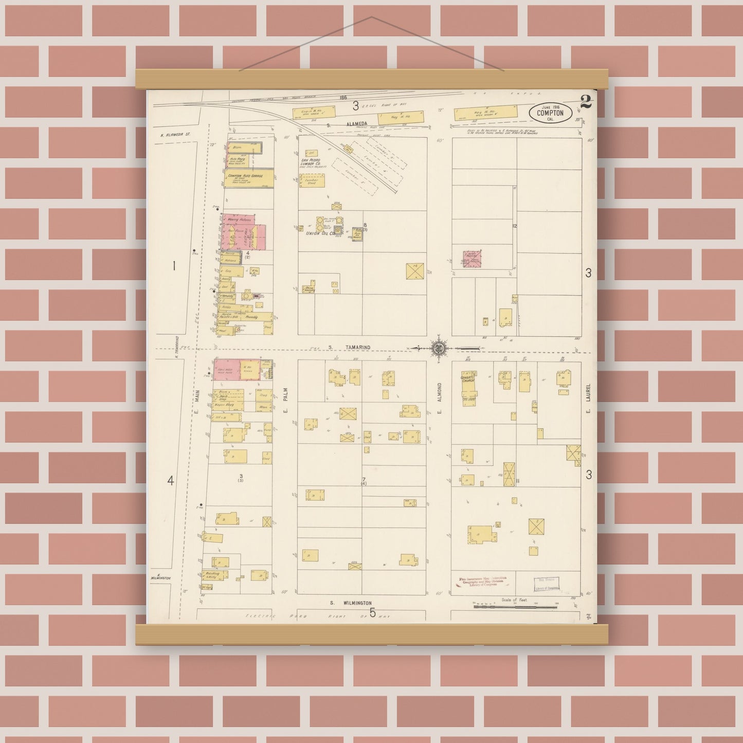 Old map wall art mockup — magnetic wood frame on brick wall — Sanborn Fire Insurance Map from Compton, Los Angeles County, California (1916), Sheet #0002