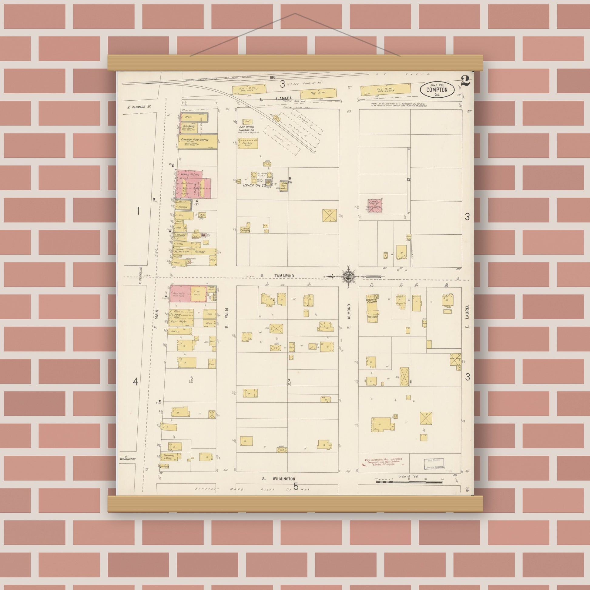 Old map wall art mockup — magnetic wood frame on brick wall — Sanborn Fire Insurance Map from Compton, Los Angeles County, California (1916), Sheet #0002