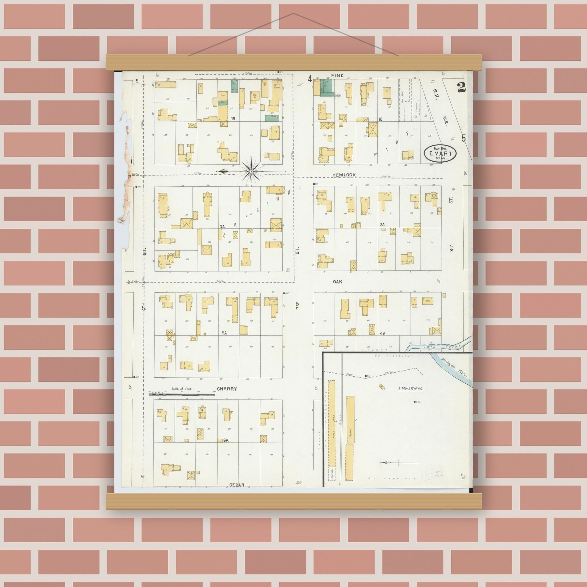 Old map wall art mockup — magnetic wood frame on brick wall — Sanborn Fire Insurance Map from Evart, Osceola County, Michigan (1904), Sheet #0002