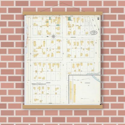 Old map wall art mockup — magnetic wood frame on brick wall — Sanborn Fire Insurance Map from Evart, Osceola County, Michigan (1904), Sheet #0002