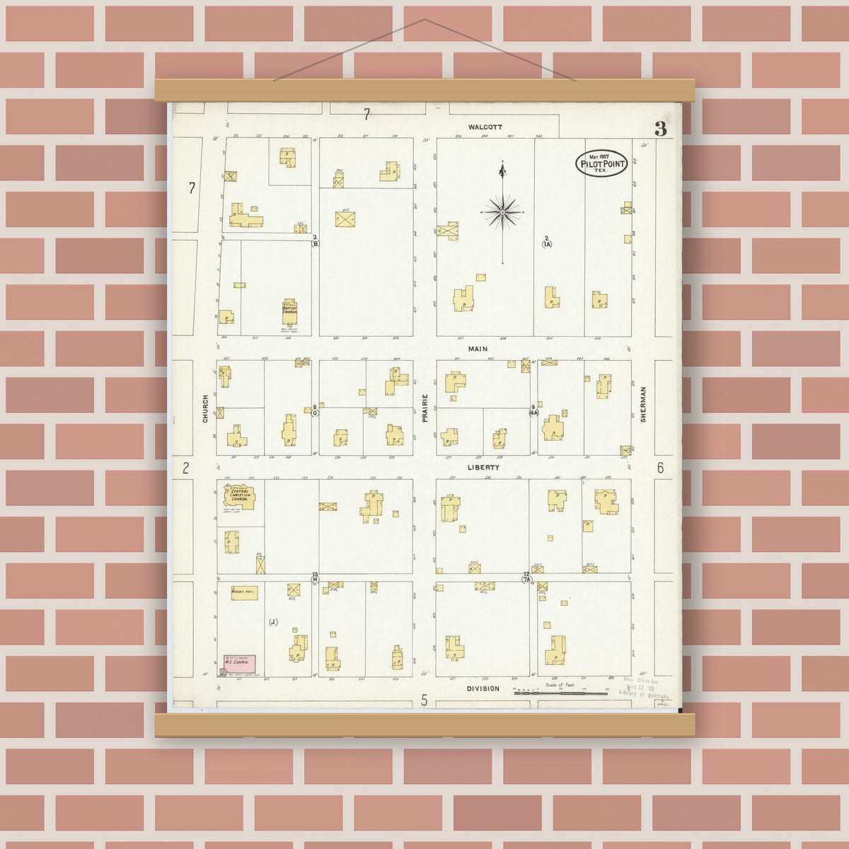 Old map wall art mockup — magnetic wood frame on brick wall — Sanborn Fire Insurance Map from Pilot Point, Denton County, Texas (1907), Sheet #0003