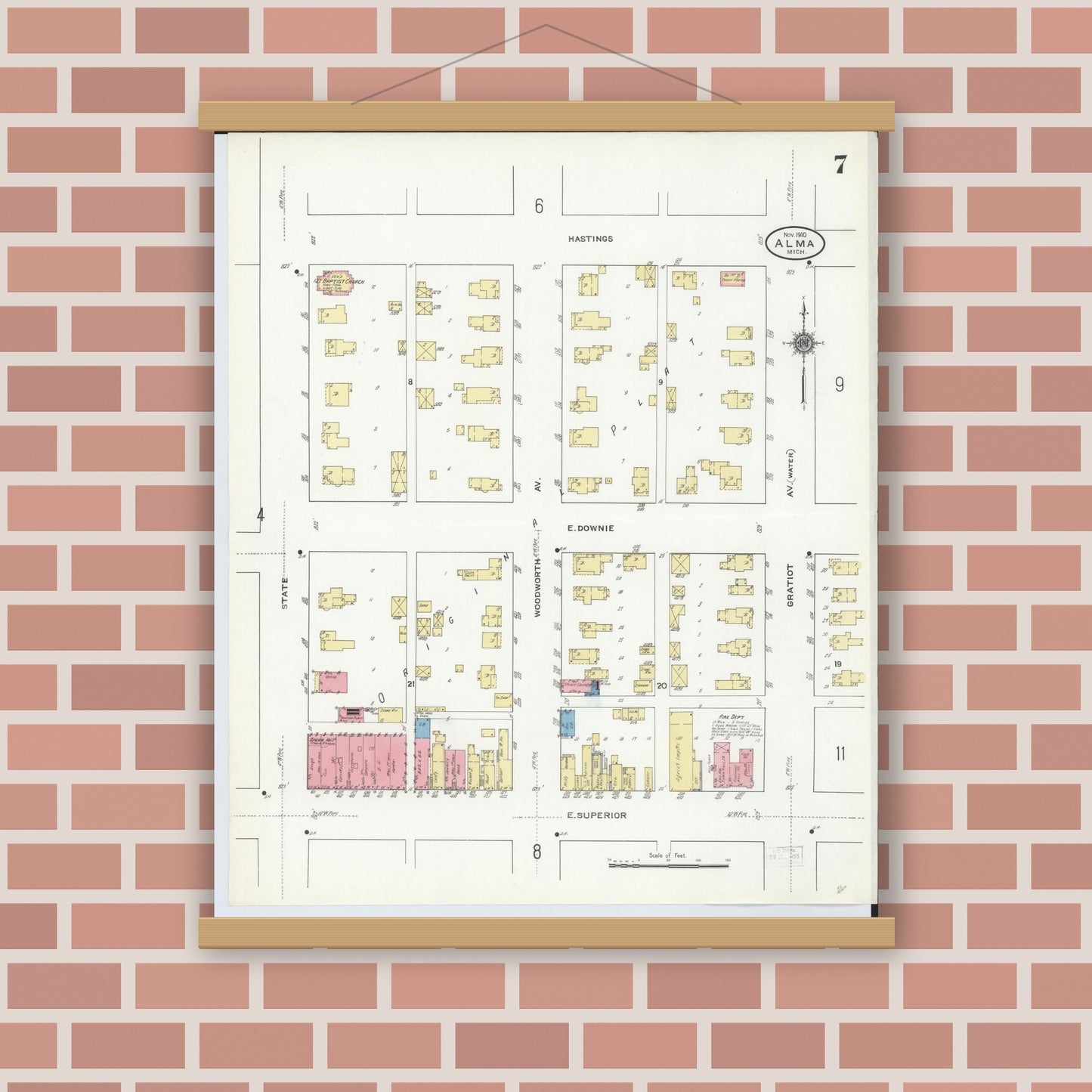 Old map wall art mockup — magnetic wood frame on brick wall — Sanborn Fire Insurance Map from Alma, Gratiot County, Michigan (1910), Sheet #0007