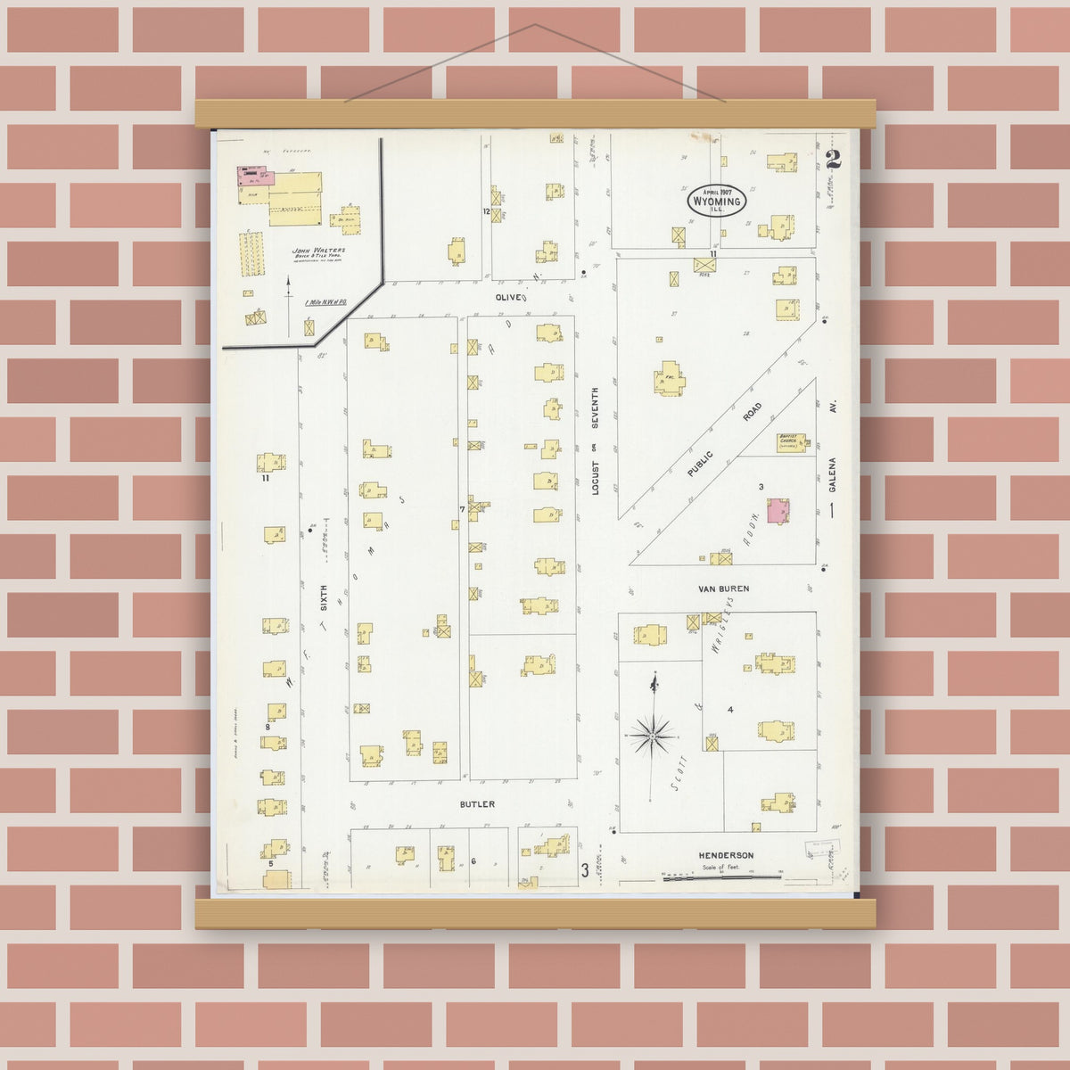 Old map wall art mockup — magnetic wood frame on brick wall — Sanborn Fire Insurance Map from Wyoming, Stark County, Illinois (1907), Sheet #0002