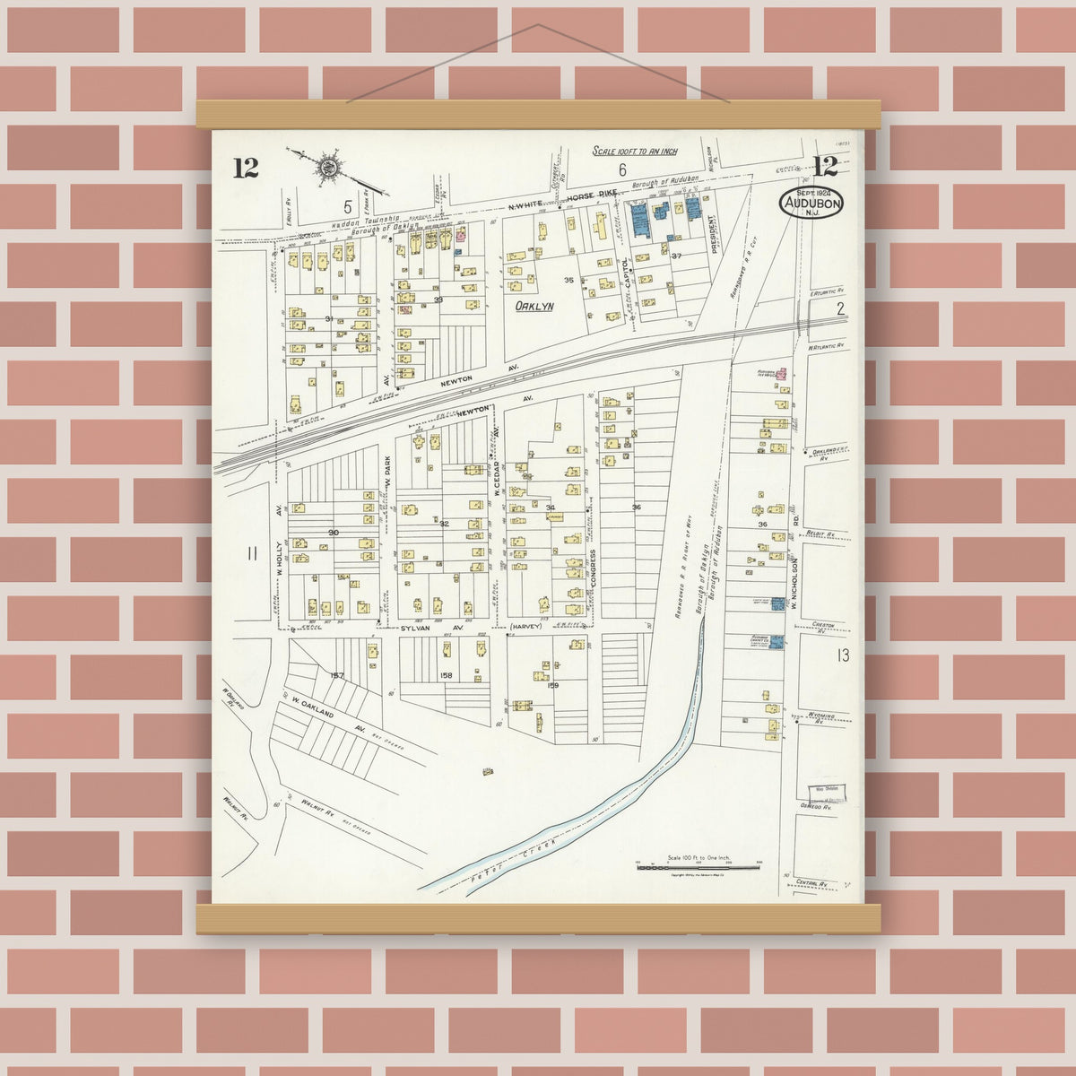 Old map wall art mockup — magnetic wood frame on brick wall — Sanborn Fire Insurance Map from Audubon, Camden County, New Jersey (1924), Sheet #0012