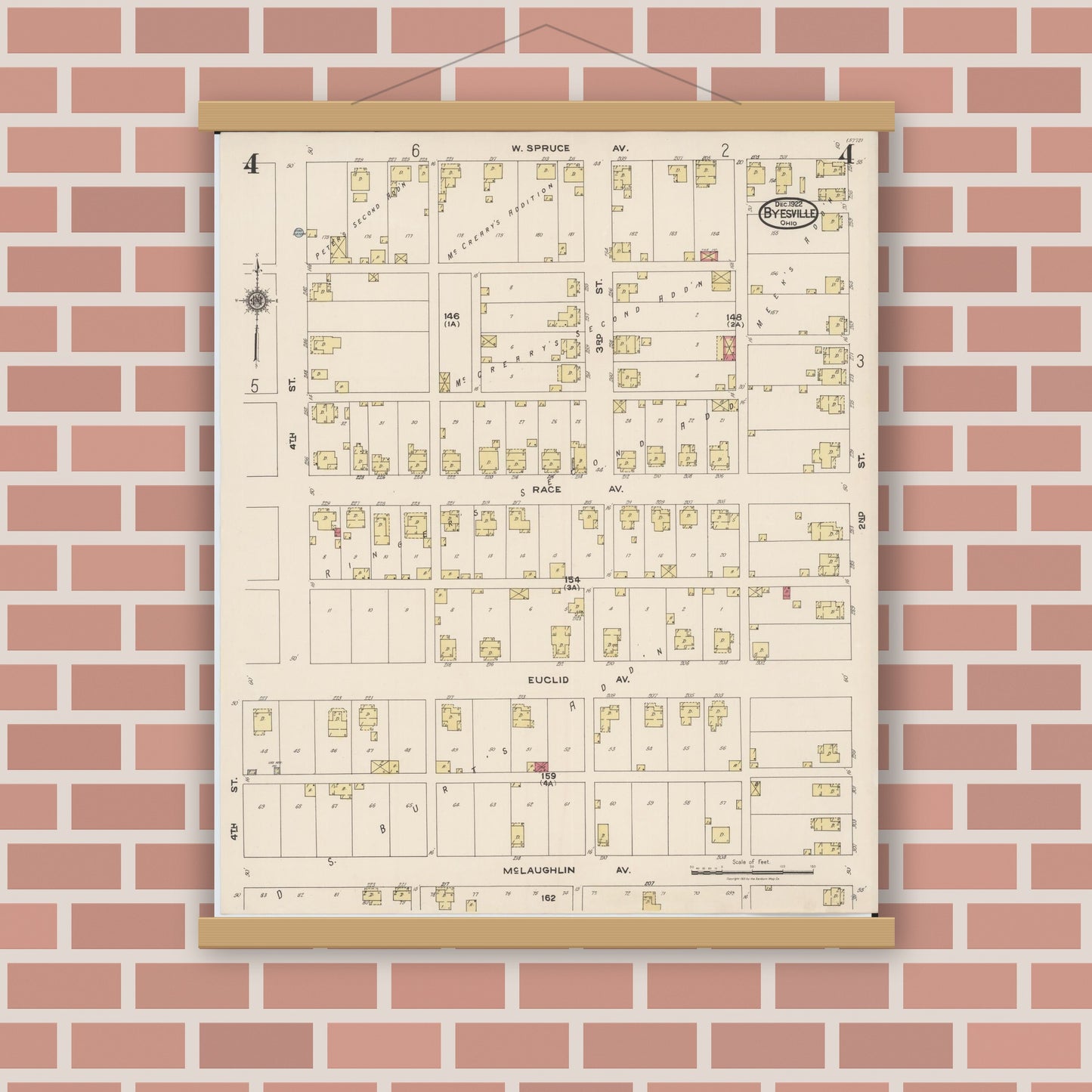 Old map wall art mockup — magnetic wood frame on brick wall — Sanborn Fire Insurance Map from Byesville, Guernsey County, Ohio (1922), Sheet #0004