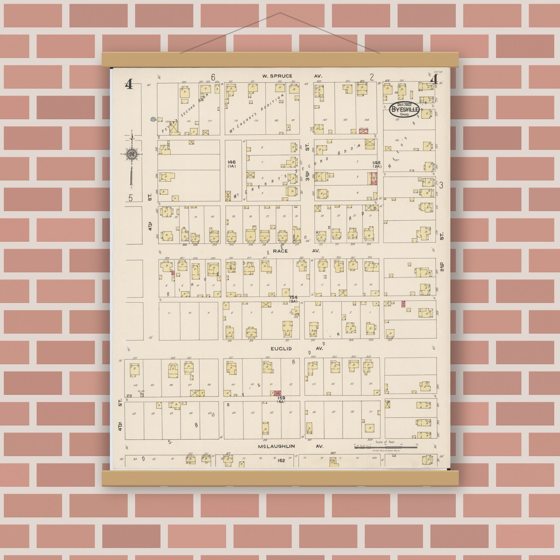 Old map wall art mockup — magnetic wood frame on brick wall — Sanborn Fire Insurance Map from Byesville, Guernsey County, Ohio (1922), Sheet #0004