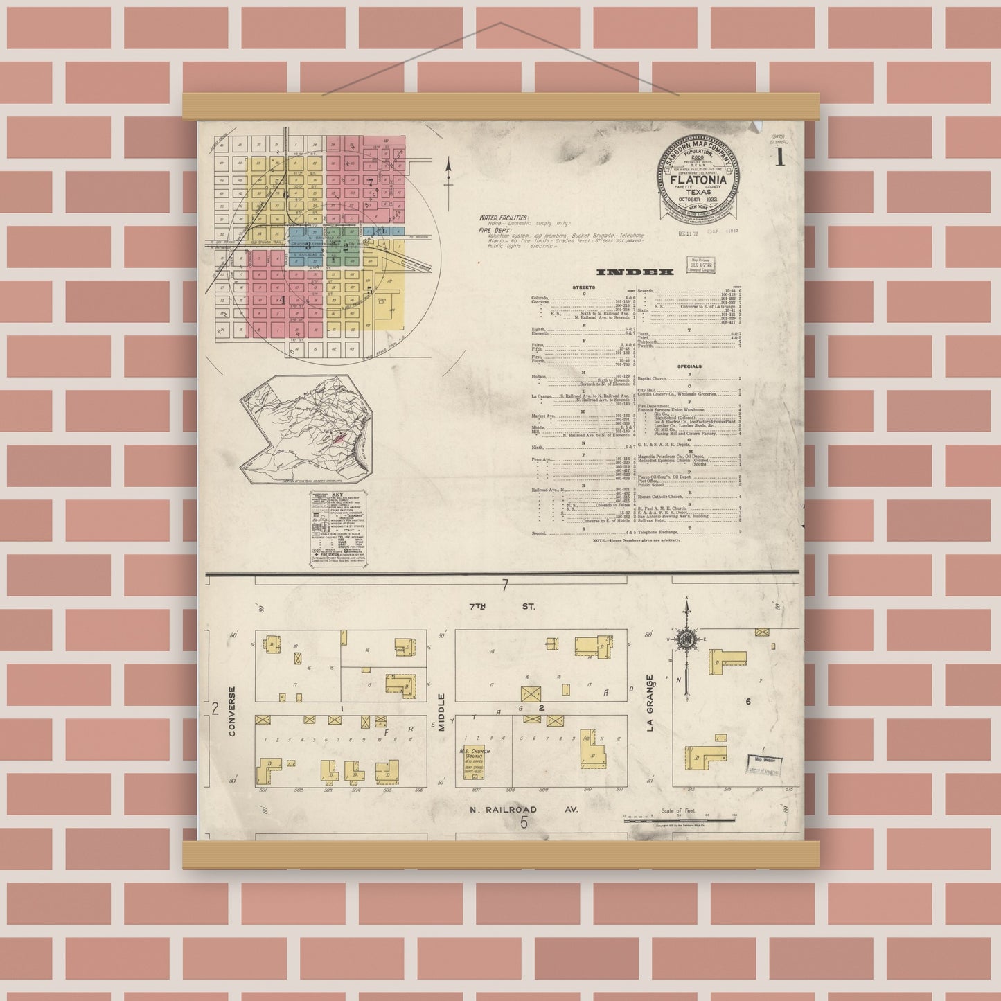 Old map wall art mockup — magnetic wood frame on brick wall — Sanborn Fire Insurance Map from Flatonia, Fayette County, Texas (1922), Sheet #0001