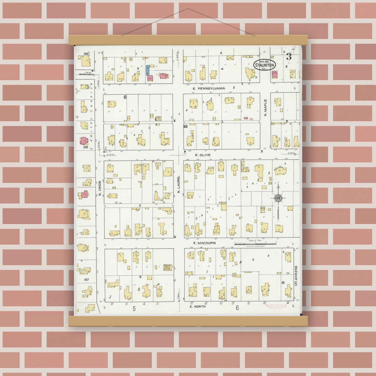 Old map wall art mockup — magnetic wood frame on brick wall — Sanborn Fire Insurance Map from Staunton, Macoupin County, Illinois (1921), Sheet #0003