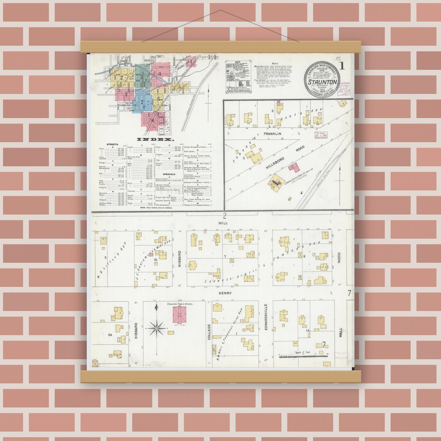 Old map wall art mockup — magnetic wood frame on brick wall — Sanborn Fire Insurance Map from Staunton, Macoupin County, Illinois (1906), Sheet #0001
