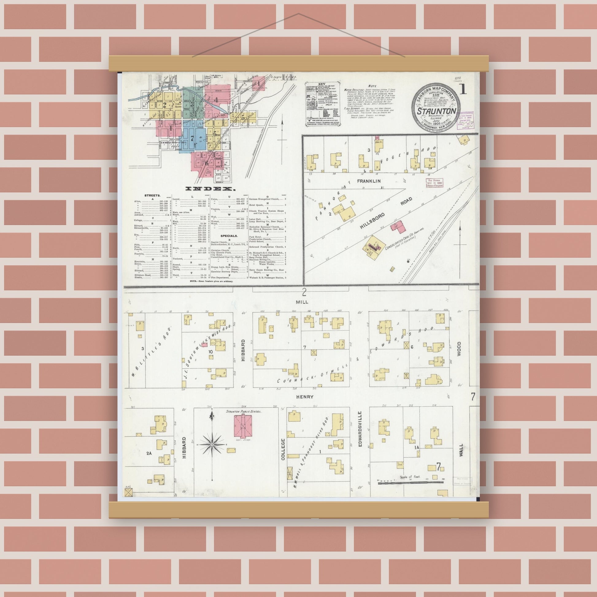 Old map wall art mockup — magnetic wood frame on brick wall — Sanborn Fire Insurance Map from Staunton, Macoupin County, Illinois (1906), Sheet #0001