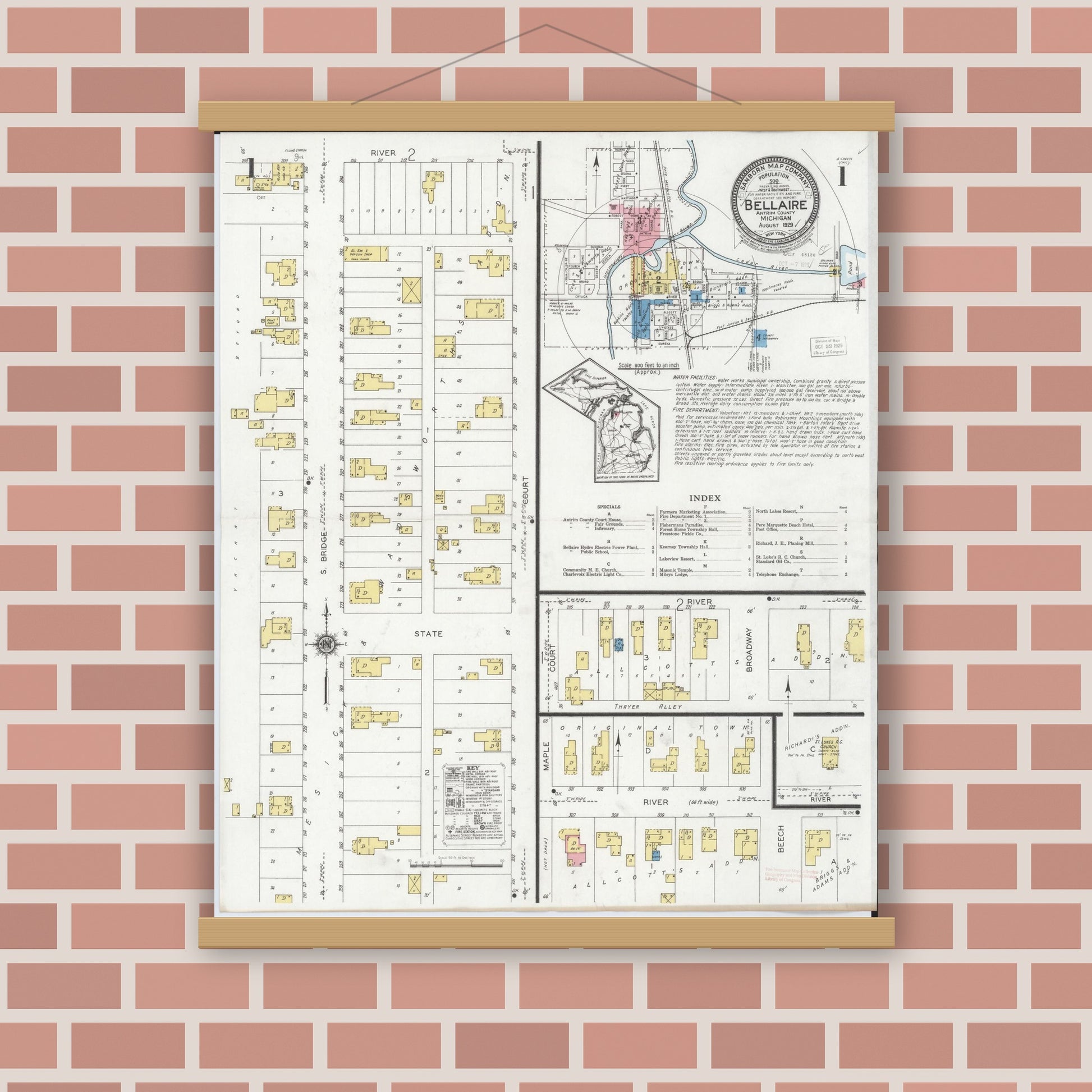 Old map wall art mockup — magnetic wood frame on brick wall — Sanborn Fire Insurance Map from Bellaire, Antrim County, Michigan (1929) - Complete Map Set