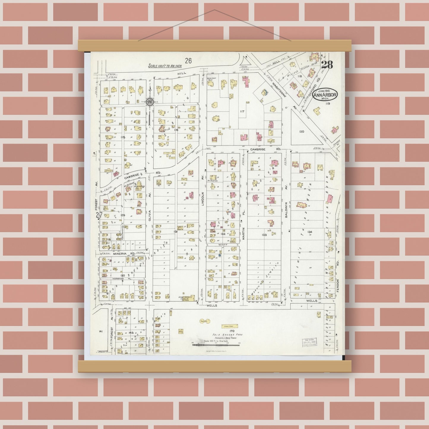 Old map wall art mockup — magnetic wood frame on brick wall — Sanborn Fire Insurance Map from Ann Arbor, Washtenaw County, Michigan (1916), Sheet #0028