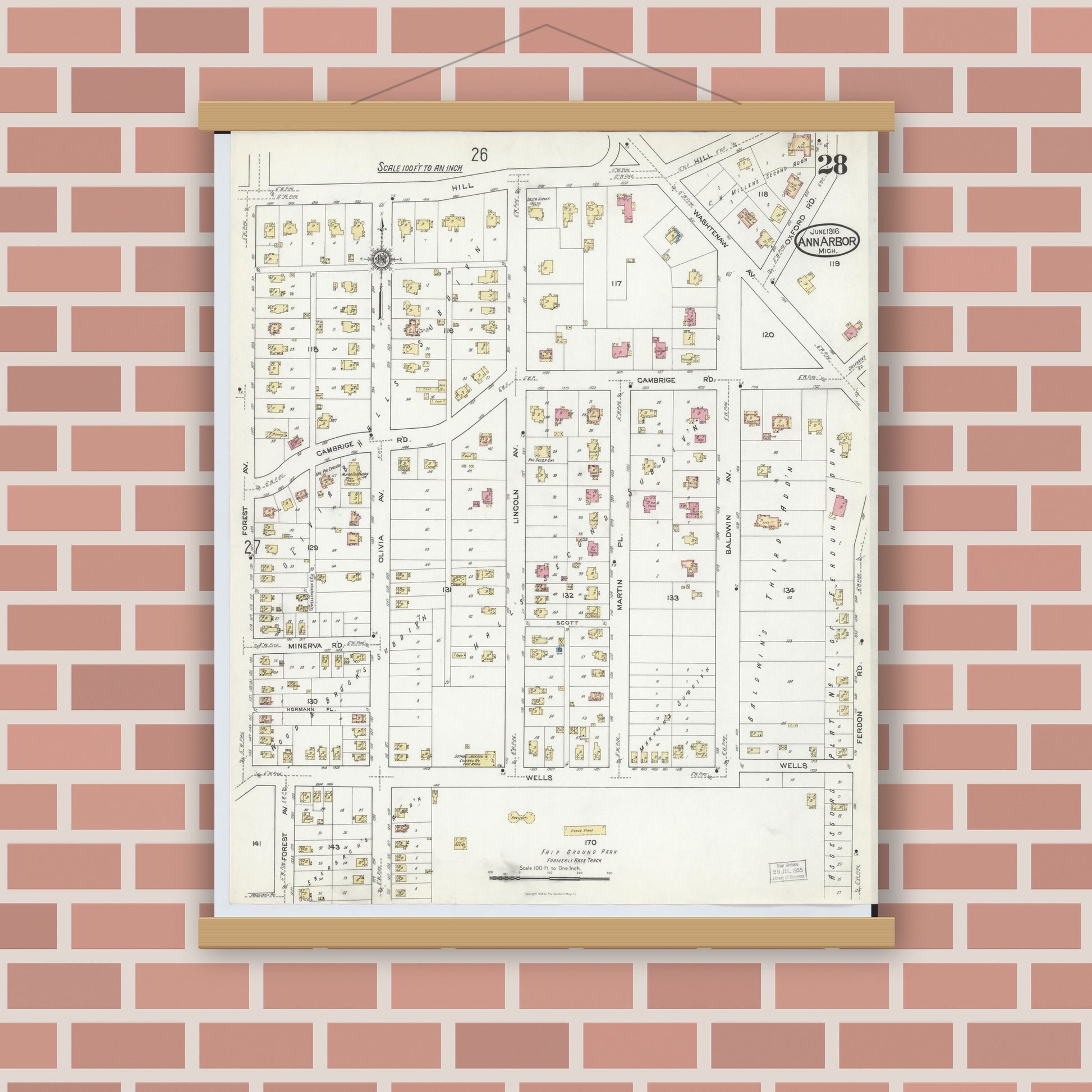 Old map wall art mockup — magnetic wood frame on brick wall — Sanborn Fire Insurance Map from Ann Arbor, Washtenaw County, Michigan (1916), Sheet #0028