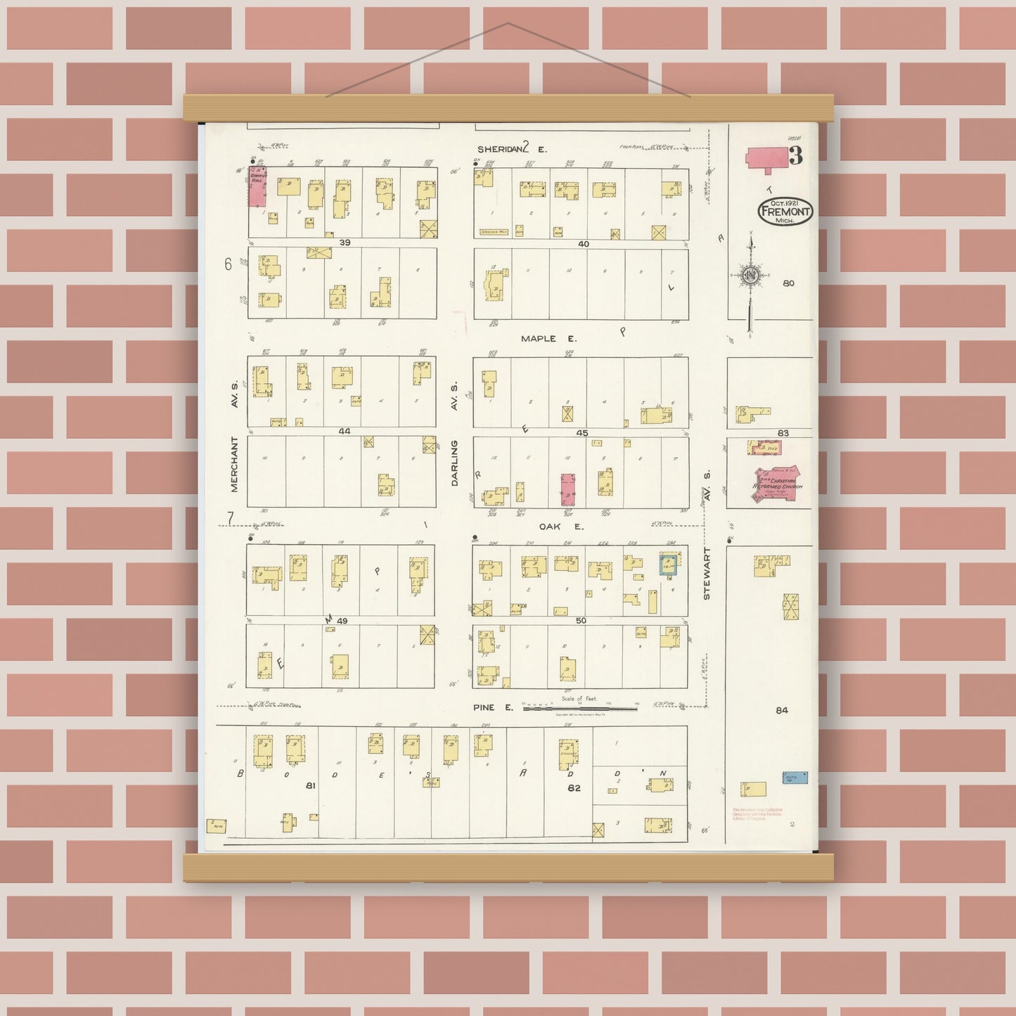 Old map wall art mockup — magnetic wood frame on brick wall — Sanborn Fire Insurance Map from Fremont, Newaygo County, Michigan (1921), Sheet #0003