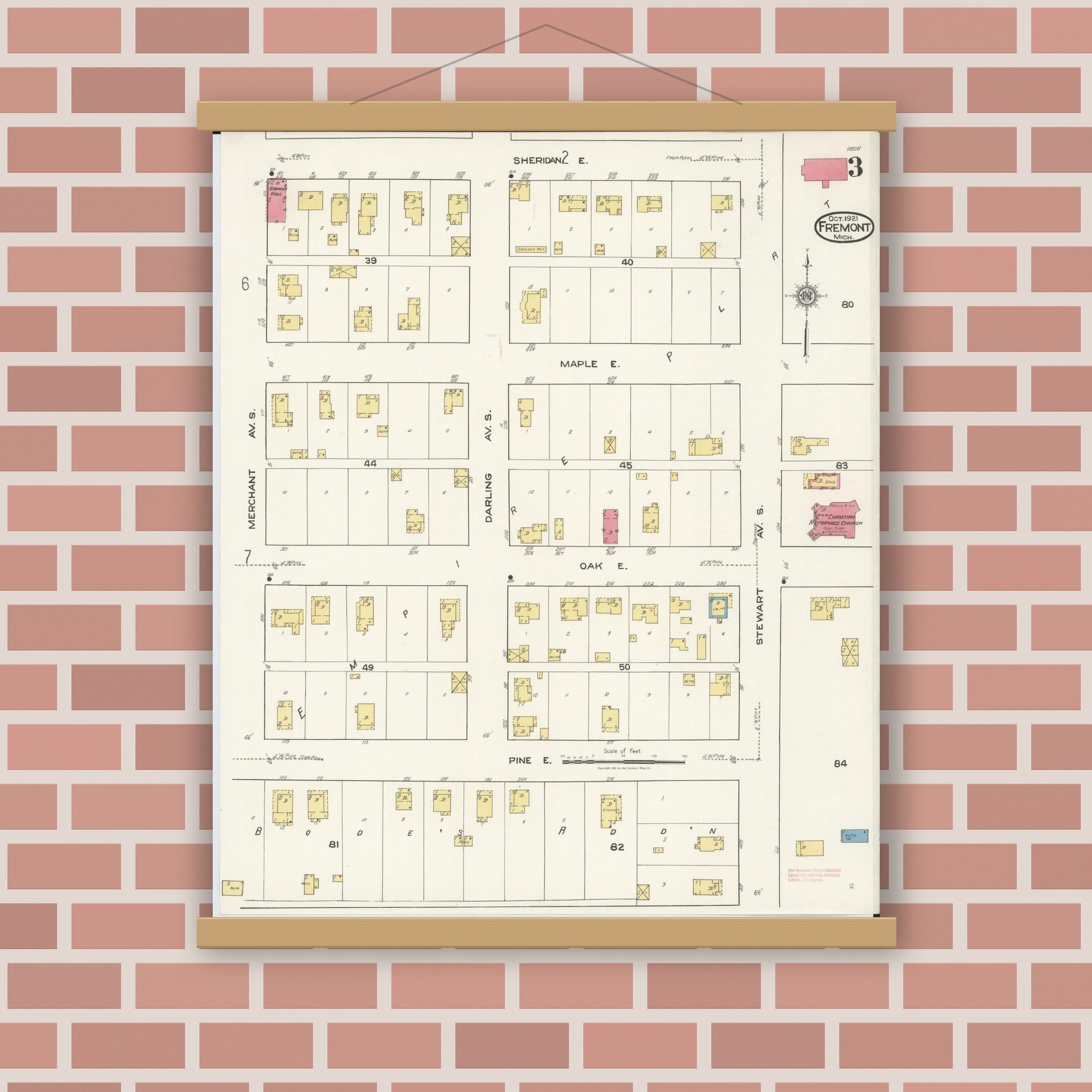 Old map wall art mockup — magnetic wood frame on brick wall — Sanborn Fire Insurance Map from Fremont, Newaygo County, Michigan (1921), Sheet #0003