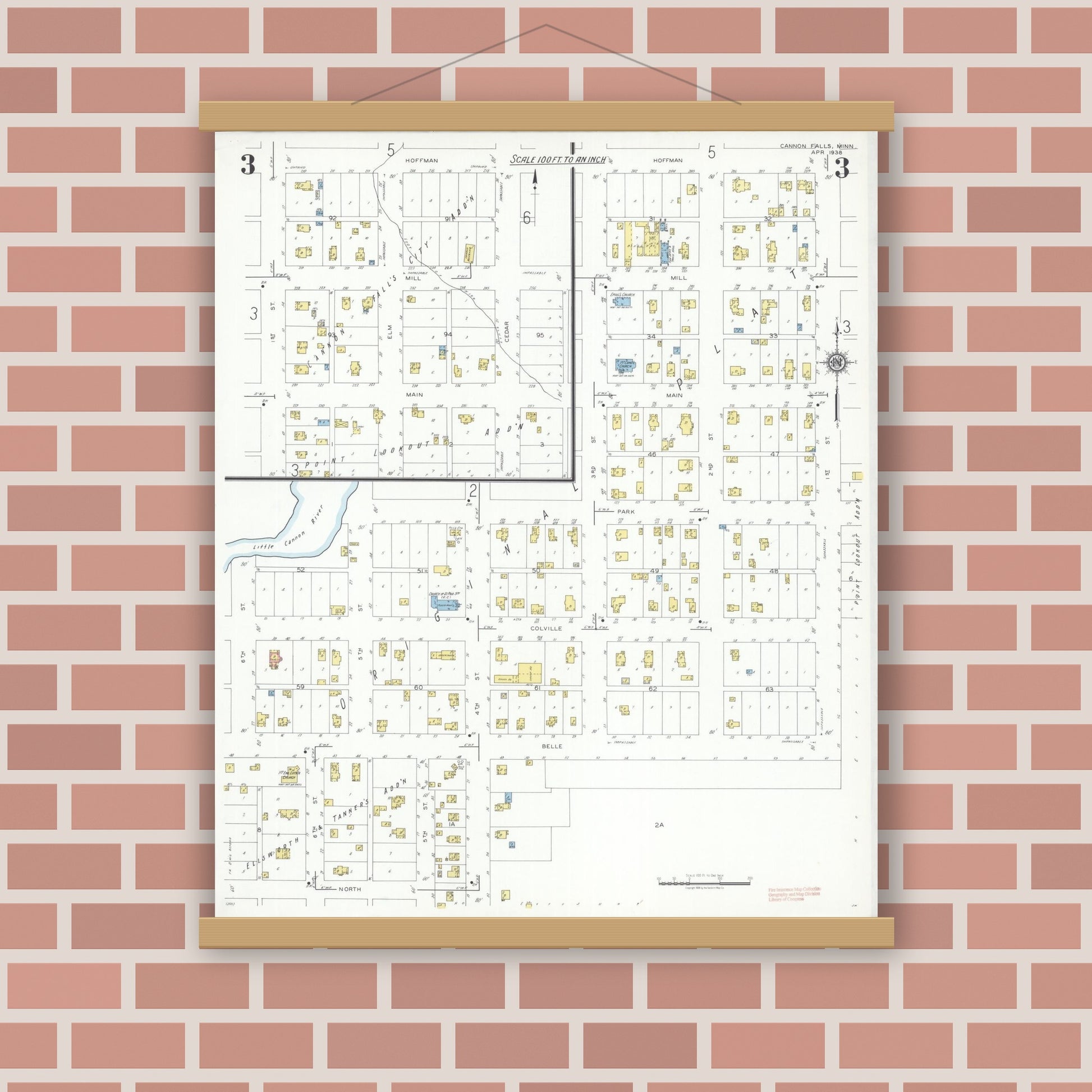 Old map wall art mockup — magnetic wood frame on brick wall — Sanborn Fire Insurance Map from Cannon Falls, Goodhue County, Minnesota (1938), Sheet #0003