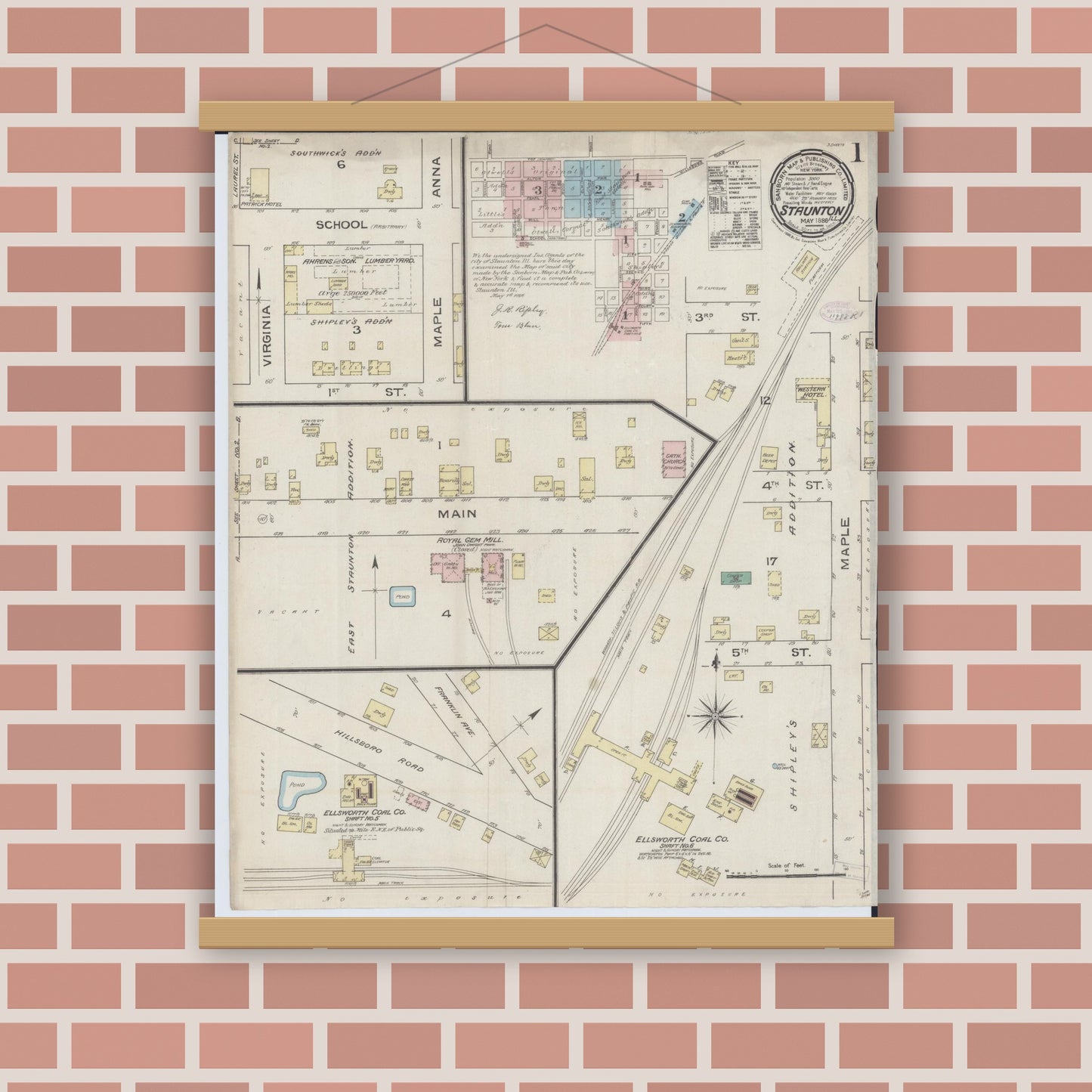 Old map wall art mockup — magnetic wood frame on brick wall — Sanborn Fire Insurance Map from Staunton, Macoupin County, Illinois (1886), Sheet #0001