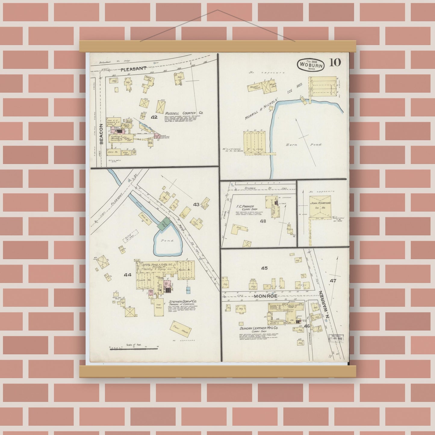 Old map wall art mockup — magnetic wood frame on brick wall — Sanborn Fire Insurance Map from Woburn, Middlesex County, Massachusetts (1888), Sheet #0010
