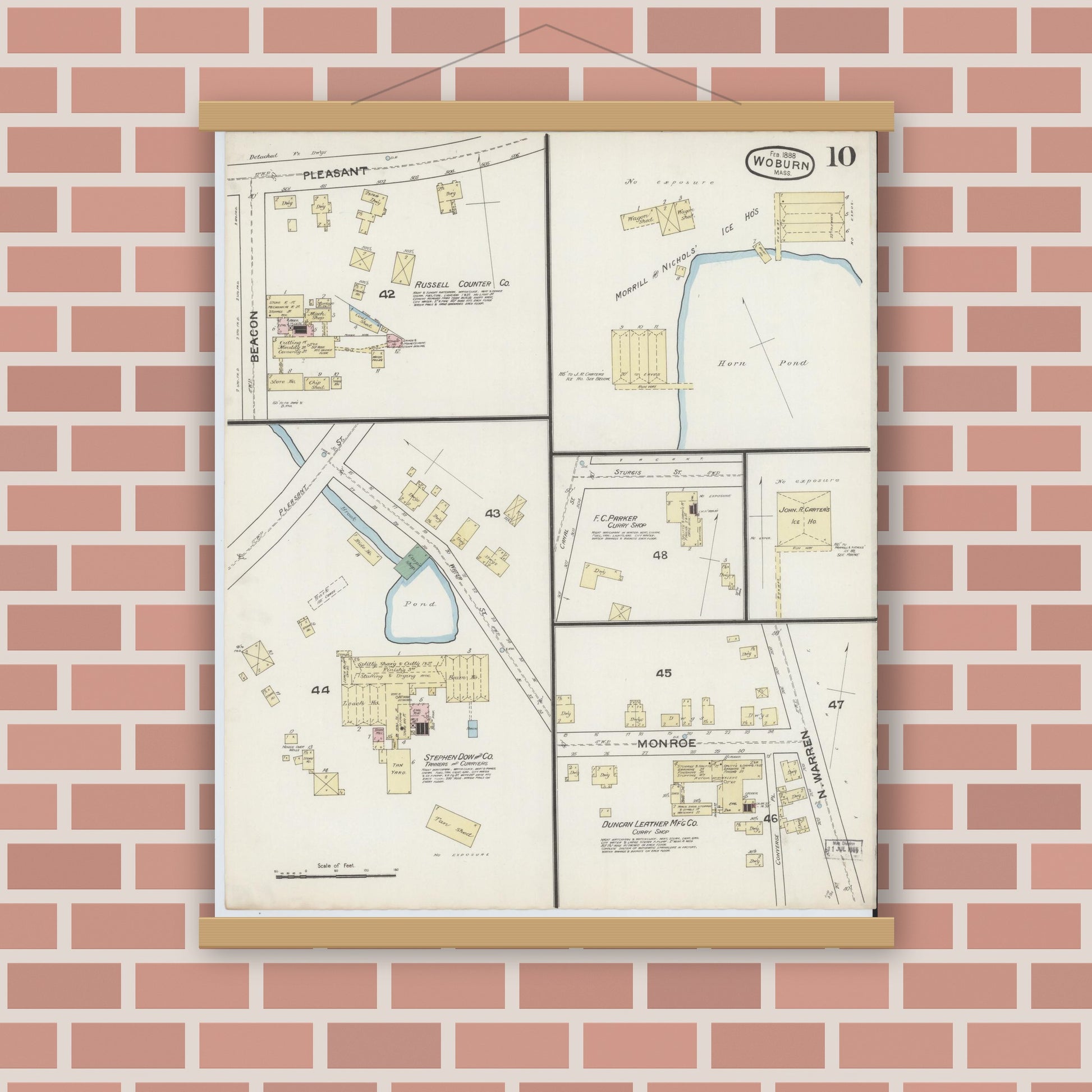 Old map wall art mockup — magnetic wood frame on brick wall — Sanborn Fire Insurance Map from Woburn, Middlesex County, Massachusetts (1888), Sheet #0010