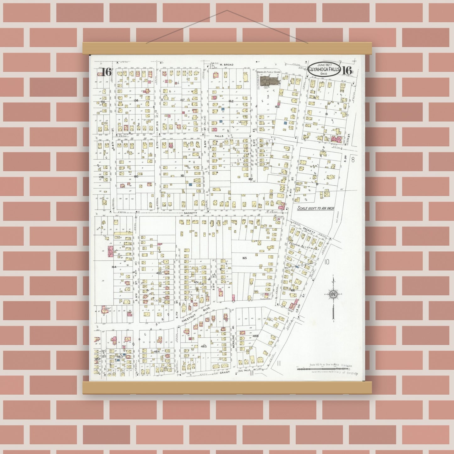 Old map wall art mockup — magnetic wood frame on brick wall — Sanborn Fire Insurance Map from Cuyahoga Falls, Summit County, Ohio (1927), Sheet #0016