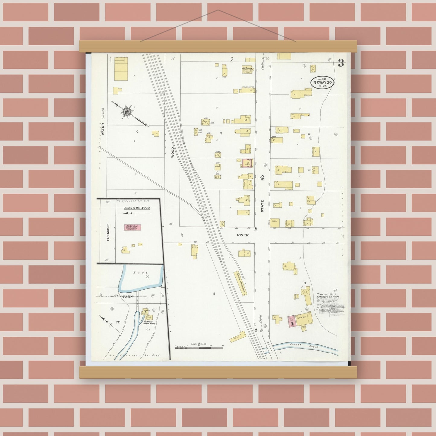 Old map wall art mockup — magnetic wood frame on brick wall — Sanborn Fire Insurance Map from Newaygo, Newaygo County, Michigan (1911), Sheet #0003