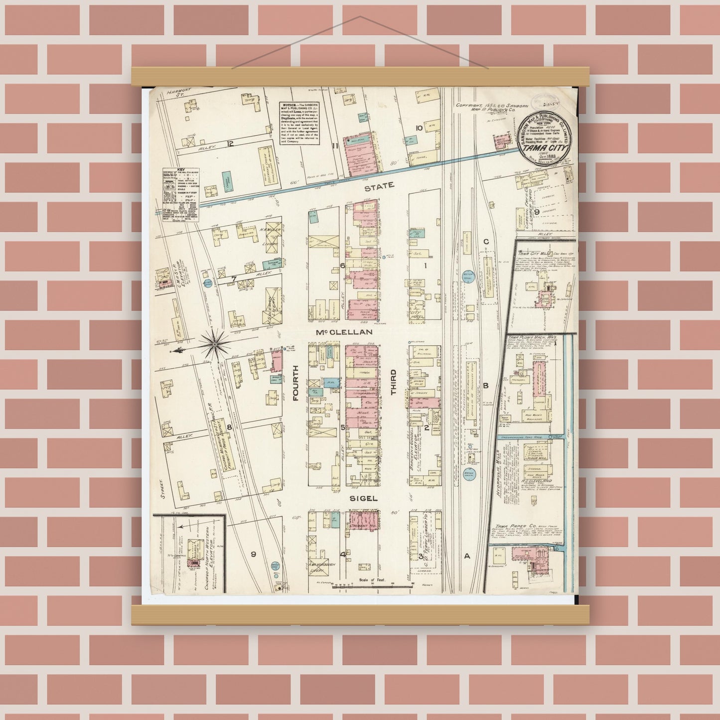 Old map wall art mockup — magnetic wood frame on brick wall — Sanborn Fire Insurance Map from Tama, Tama County, Iowa (1883), Sheet #0001
