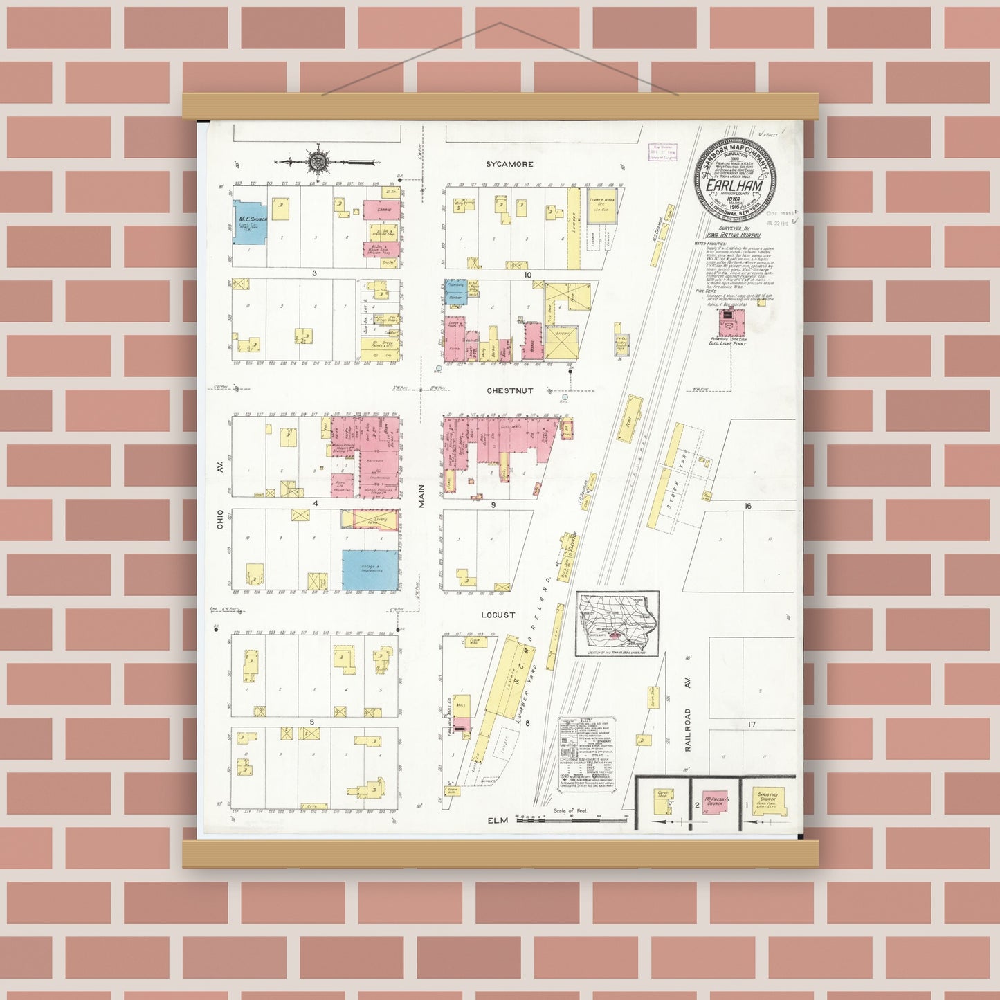 Old map wall art mockup — magnetic wood frame on brick wall — Sanborn Fire Insurance Map from Earlham, Madison County, Iowa (1916), Sheet #0001