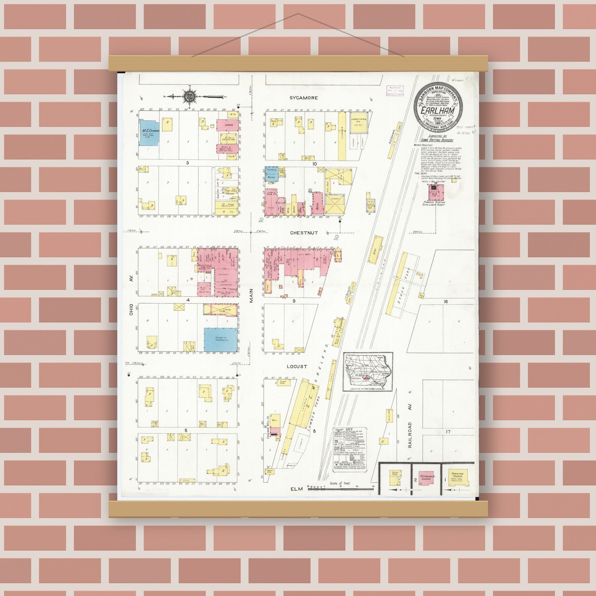 Old map wall art mockup — magnetic wood frame on brick wall — Sanborn Fire Insurance Map from Earlham, Madison County, Iowa (1916), Sheet #0001