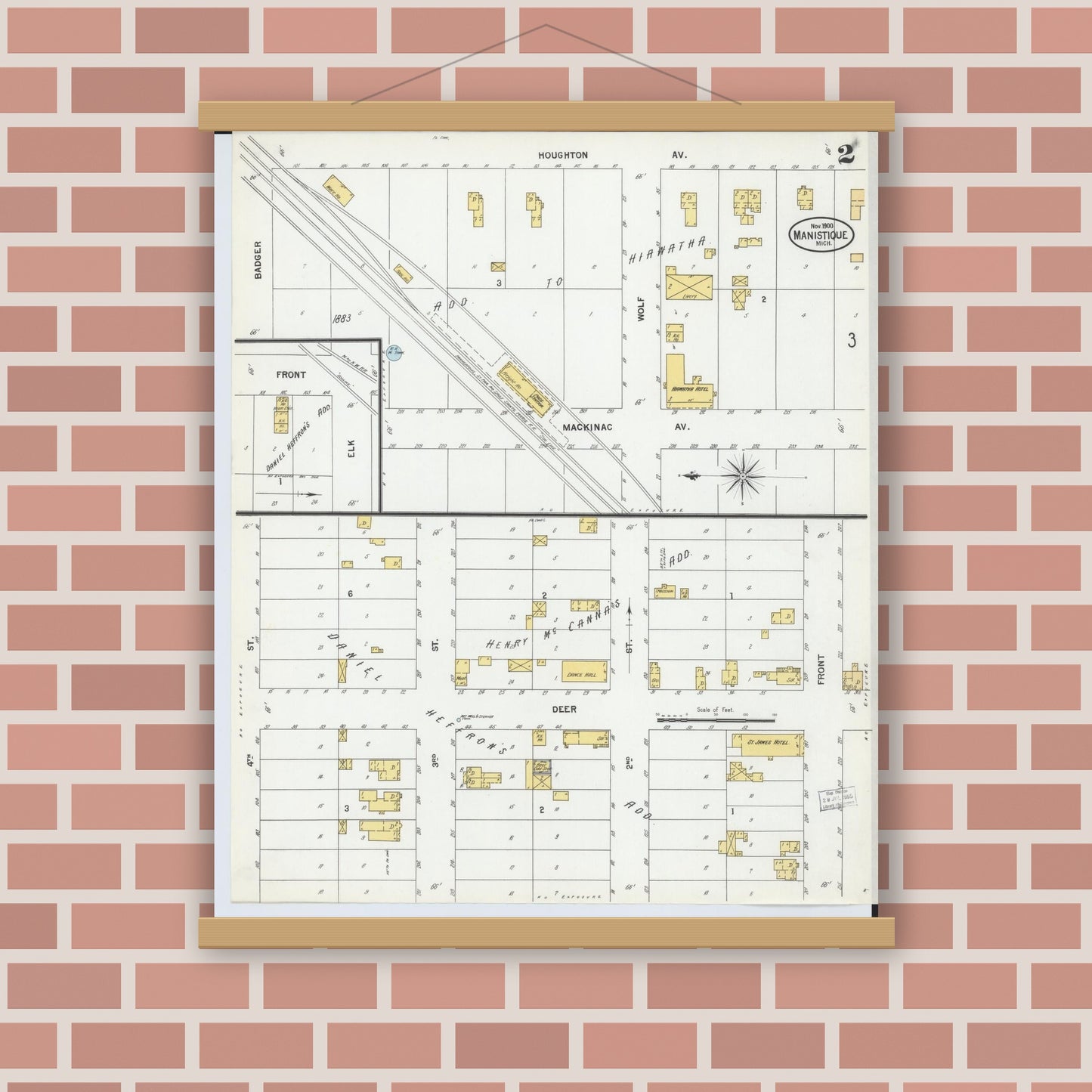 Old map wall art mockup — magnetic wood frame on brick wall — Sanborn Fire Insurance Map from Manistique, Schoolcraft County, Michigan (1900), Sheet #0002