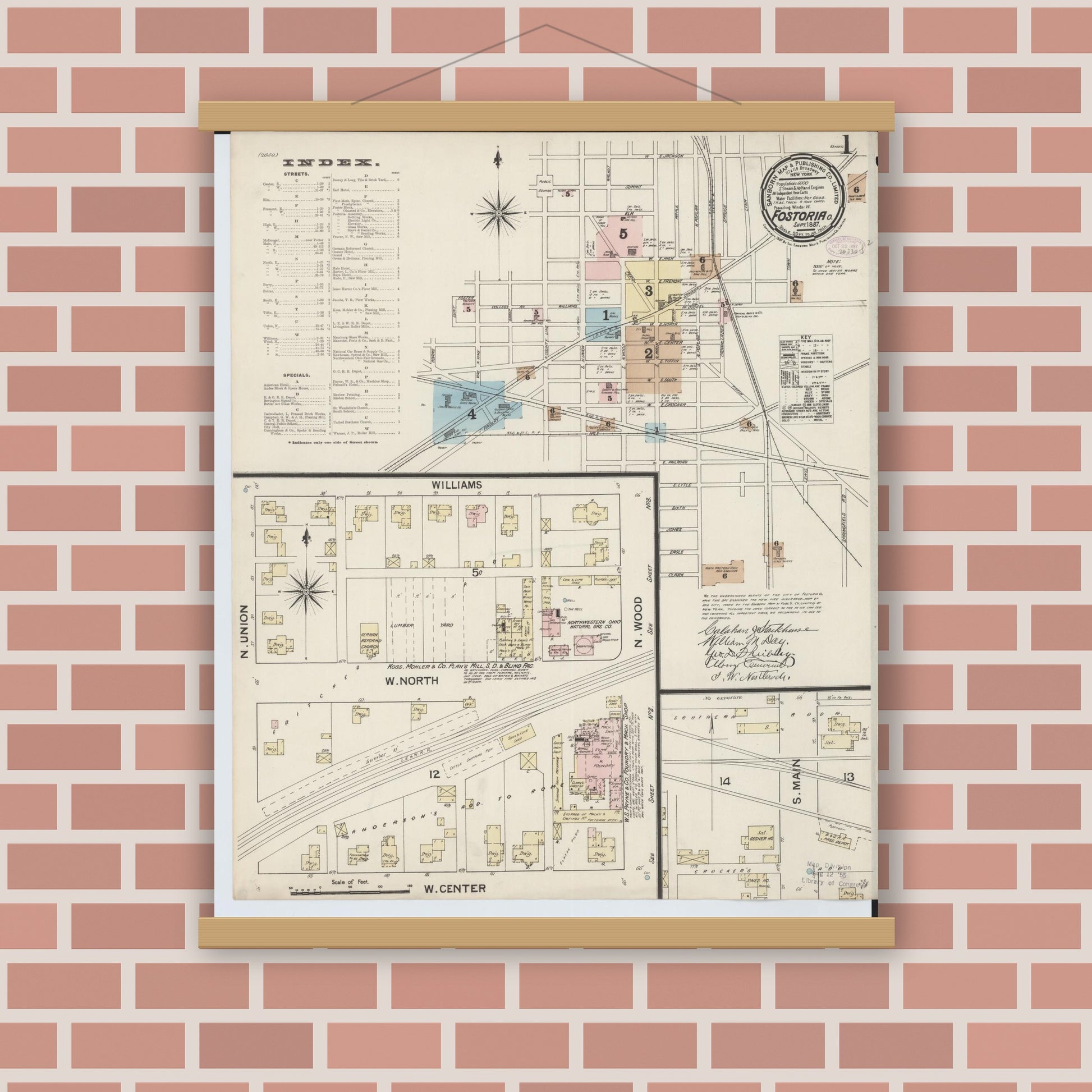 Old map wall art mockup — magnetic wood frame on brick wall — Sanborn Fire Insurance Map from Fostoria, Seneca, Hancock, And Wood Counties, Ohio (1887) - Complete Map Set