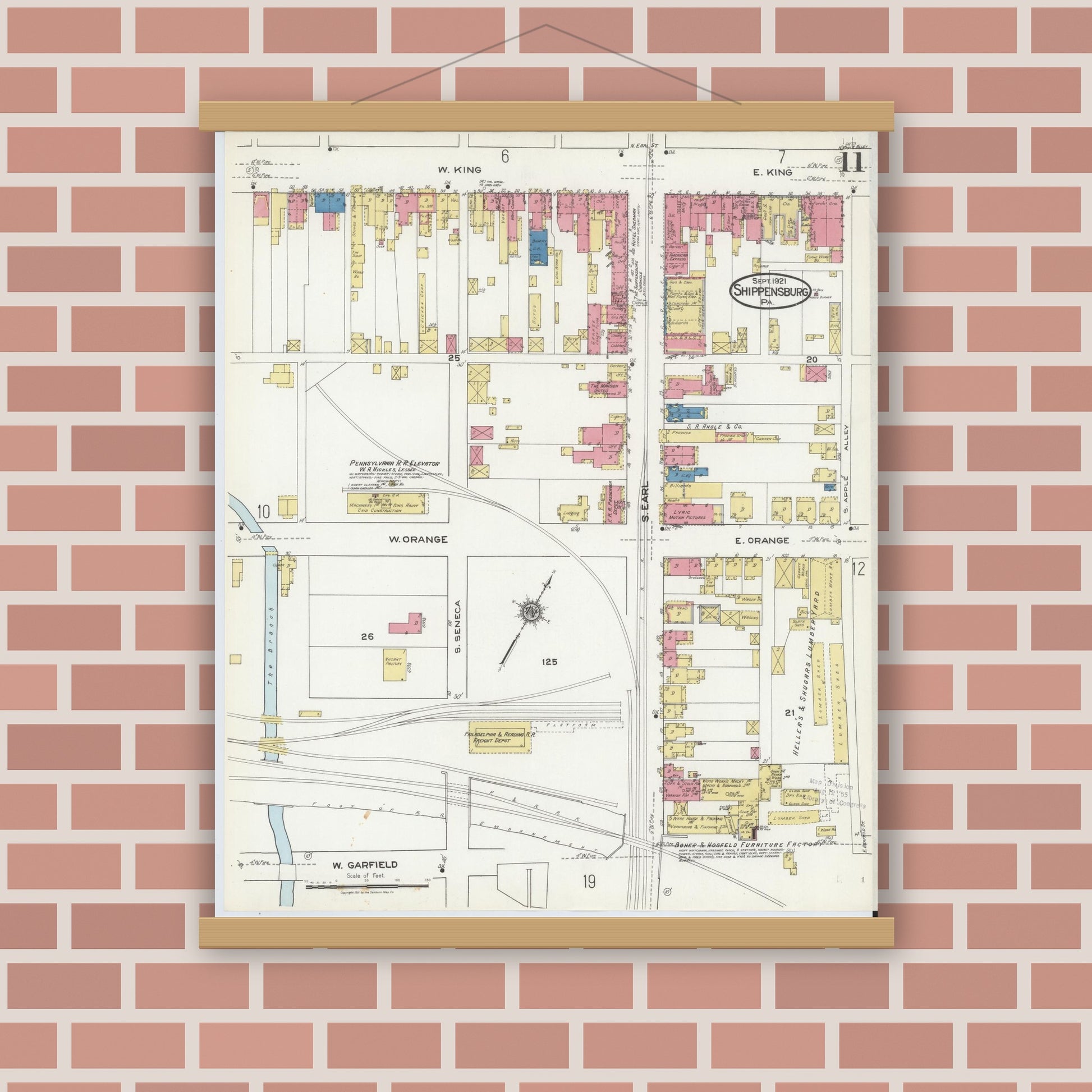 Old map wall art mockup — magnetic wood frame on brick wall — Sanborn Fire Insurance Map from Shippensburg, Cumberland And Franklin Counties, Pennsylvania (1921), Sheet #0011