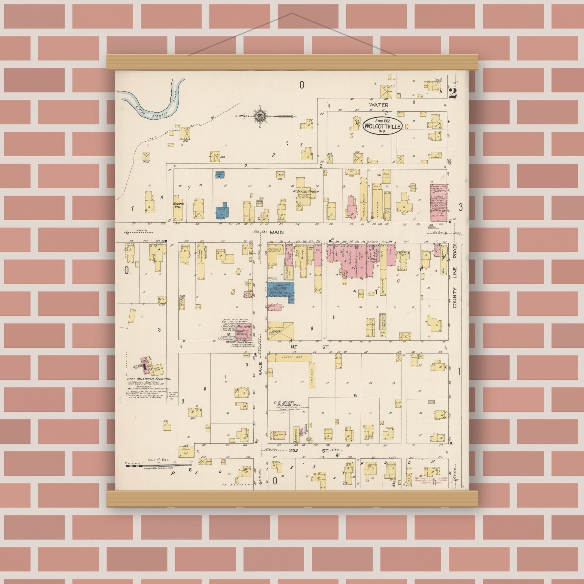 Old map wall art mockup — magnetic wood frame on brick wall — Sanborn Fire Insurance Map from Wolcottville, Noble And LaGrange Counties, Indiana (1922), Sheet #0002