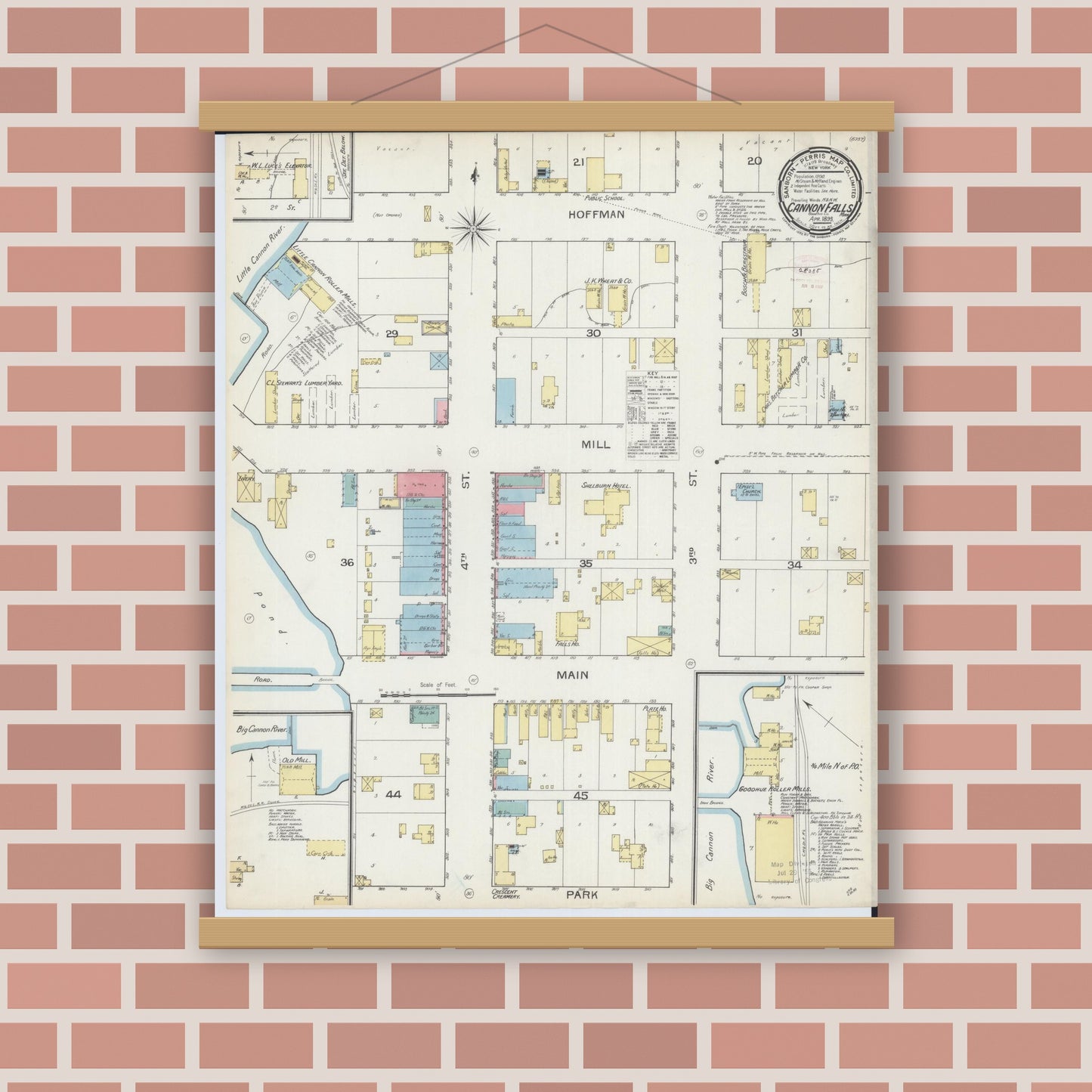 Old map wall art mockup — magnetic wood frame on brick wall — Sanborn Fire Insurance Map from Cannon Falls, Goodhue County, Minnesota (1893), Sheet #0001