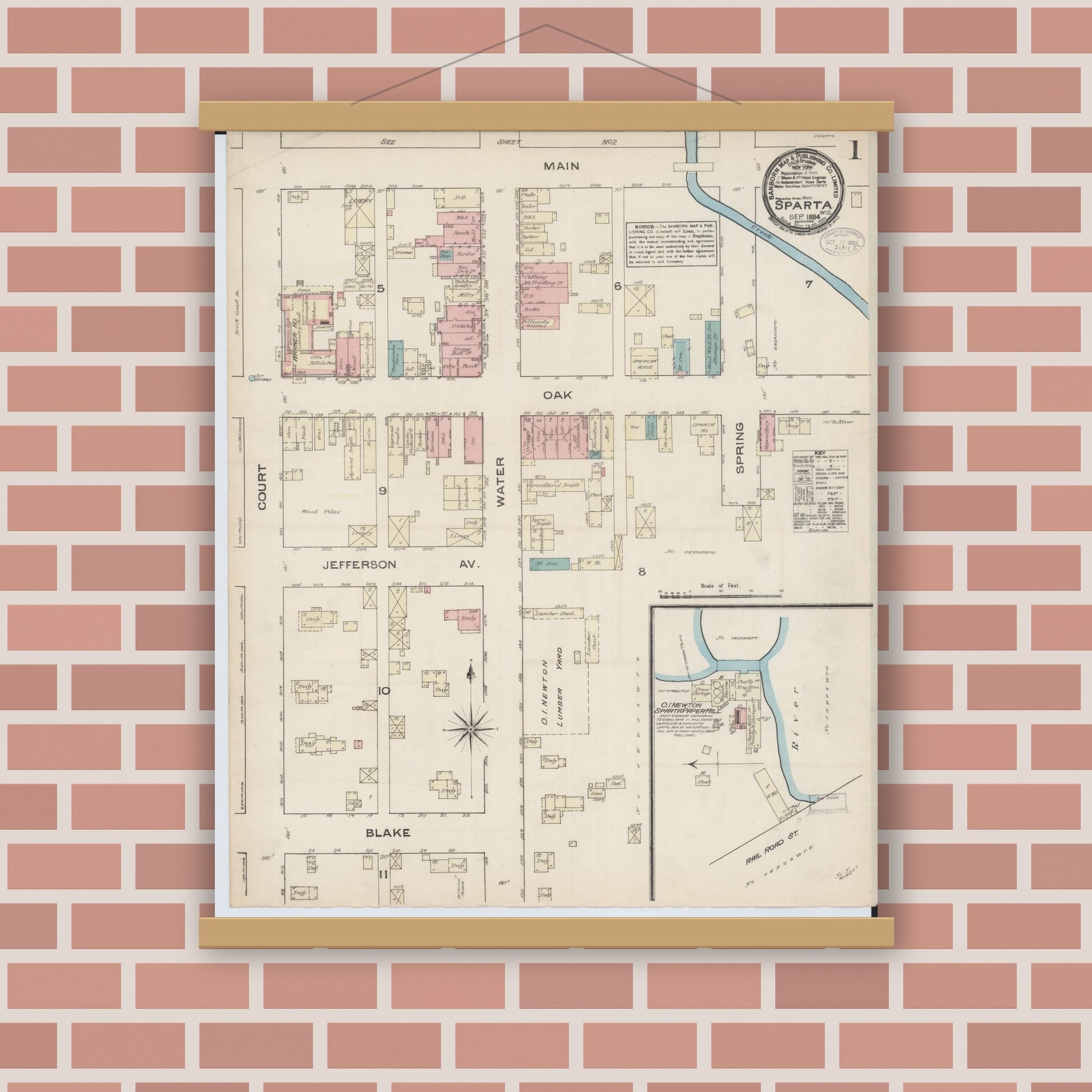 Old map wall art mockup — magnetic wood frame on brick wall — Sanborn Fire Insurance Map from Sparta, Monroe County, Wisconsin (1884), Sheet #0001