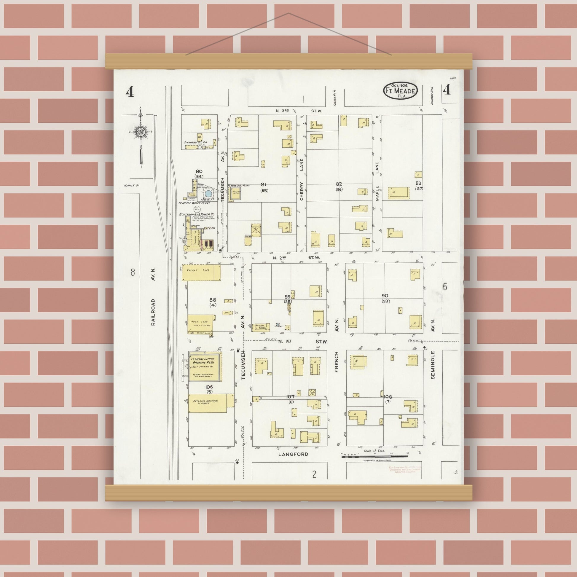 Old map wall art mockup — magnetic wood frame on brick wall — Sanborn Fire Insurance Map from Fort Meade, Polk County, Florida (1924), Sheet #0004