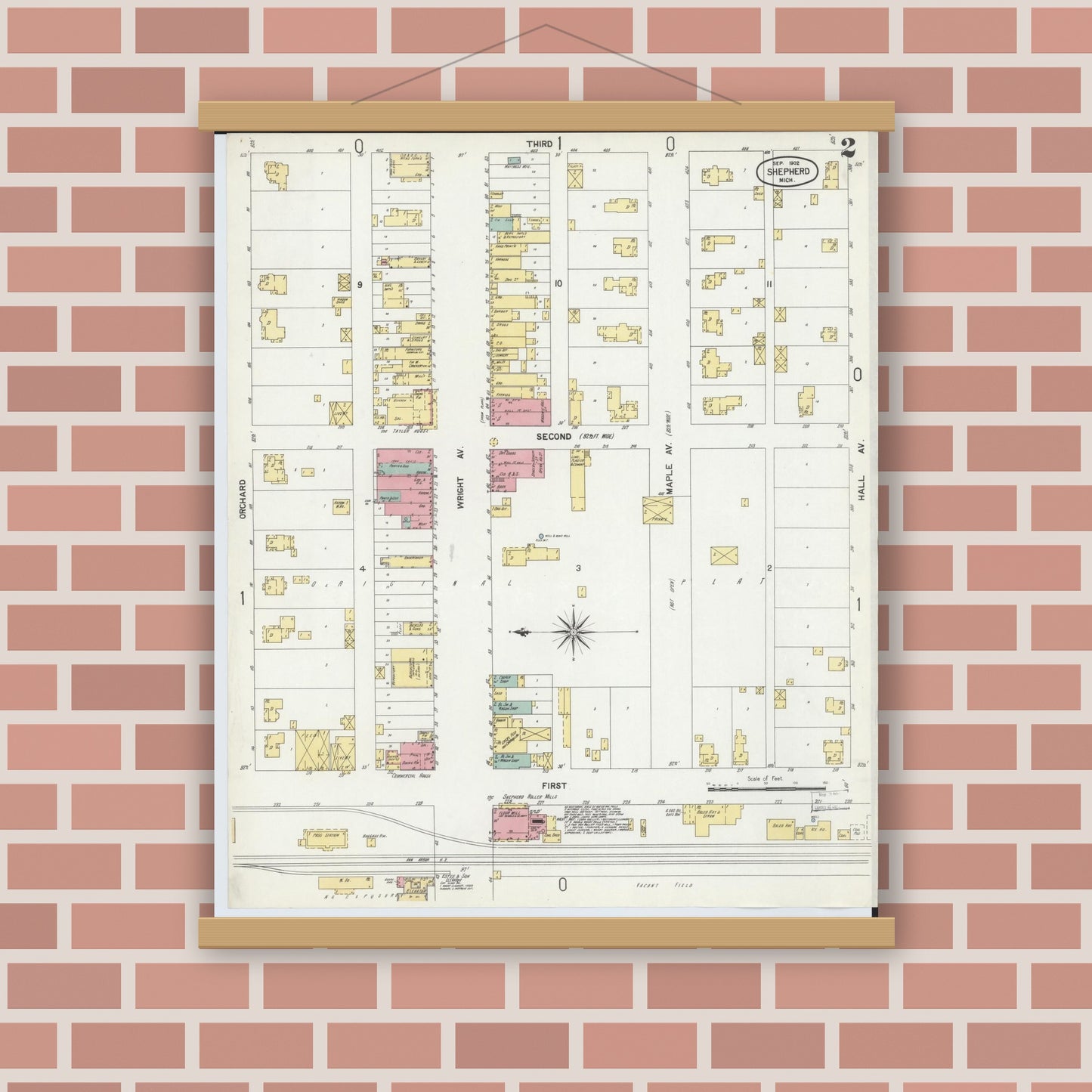 Old map wall art mockup — magnetic wood frame on brick wall — Sanborn Fire Insurance Map from Shepherd, Isabella County, Michigan (1902), Sheet #0002