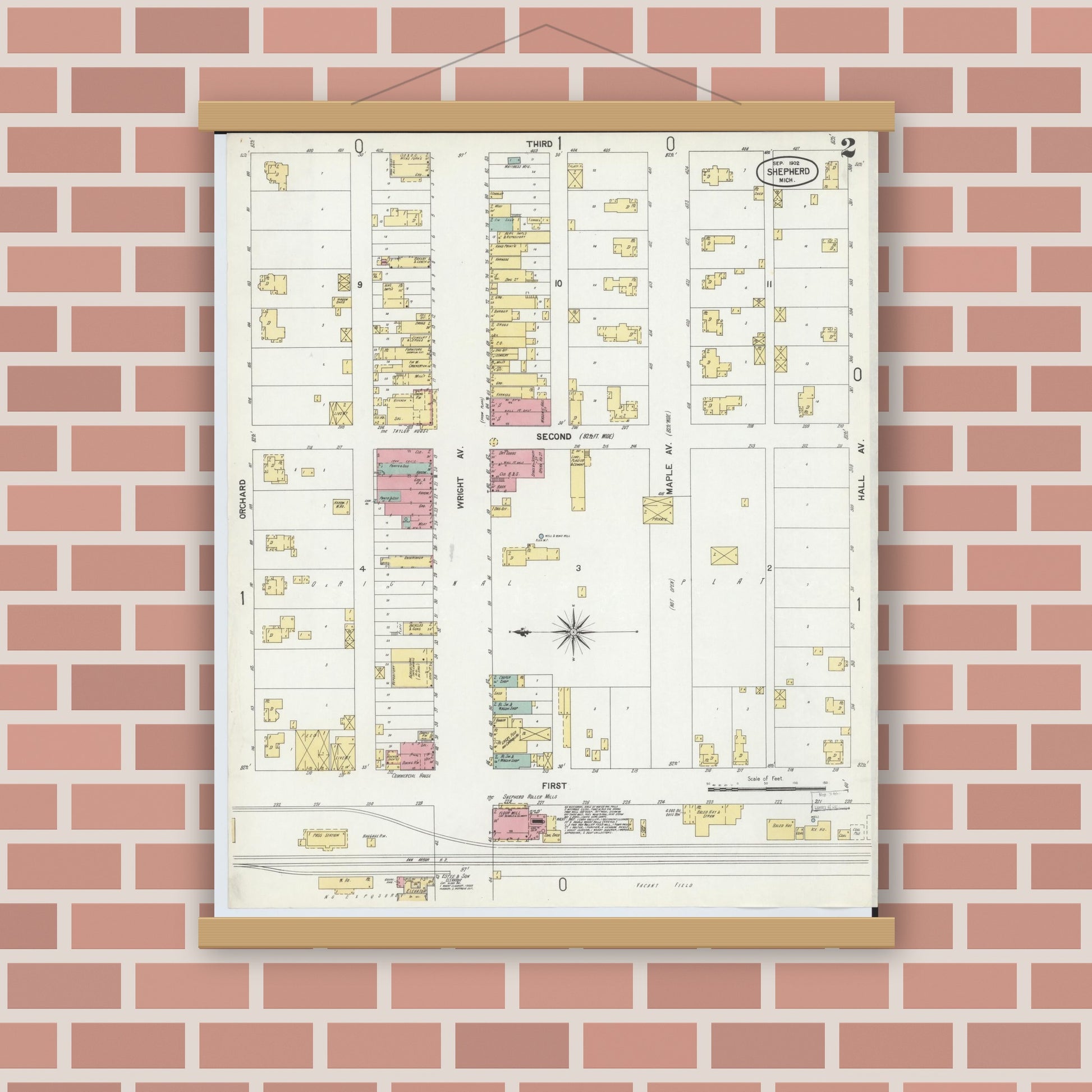 Old map wall art mockup — magnetic wood frame on brick wall — Sanborn Fire Insurance Map from Shepherd, Isabella County, Michigan (1902), Sheet #0002