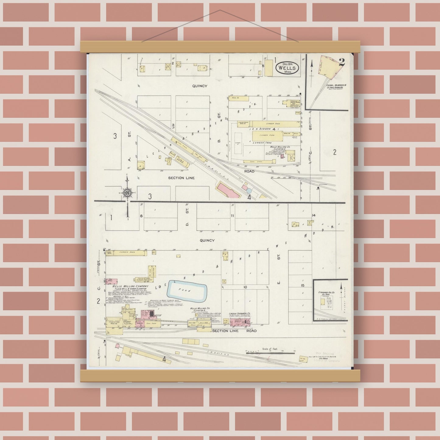 Old map wall art mockup — magnetic wood frame on brick wall — Sanborn Fire Insurance Map from Wells, Faribault County, Minnesota (1914), Sheet #0002