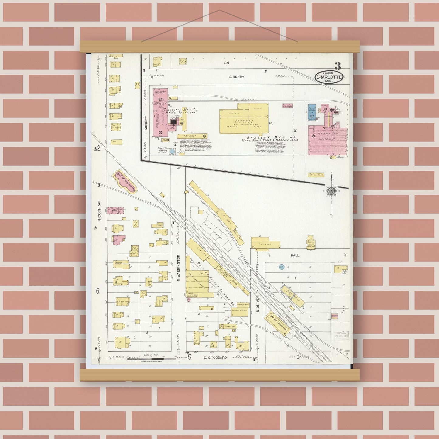 Old map wall art mockup — magnetic wood frame on brick wall — Sanborn Fire Insurance Map from Charlotte, Eaton County, Michigan (1918), Sheet #0003