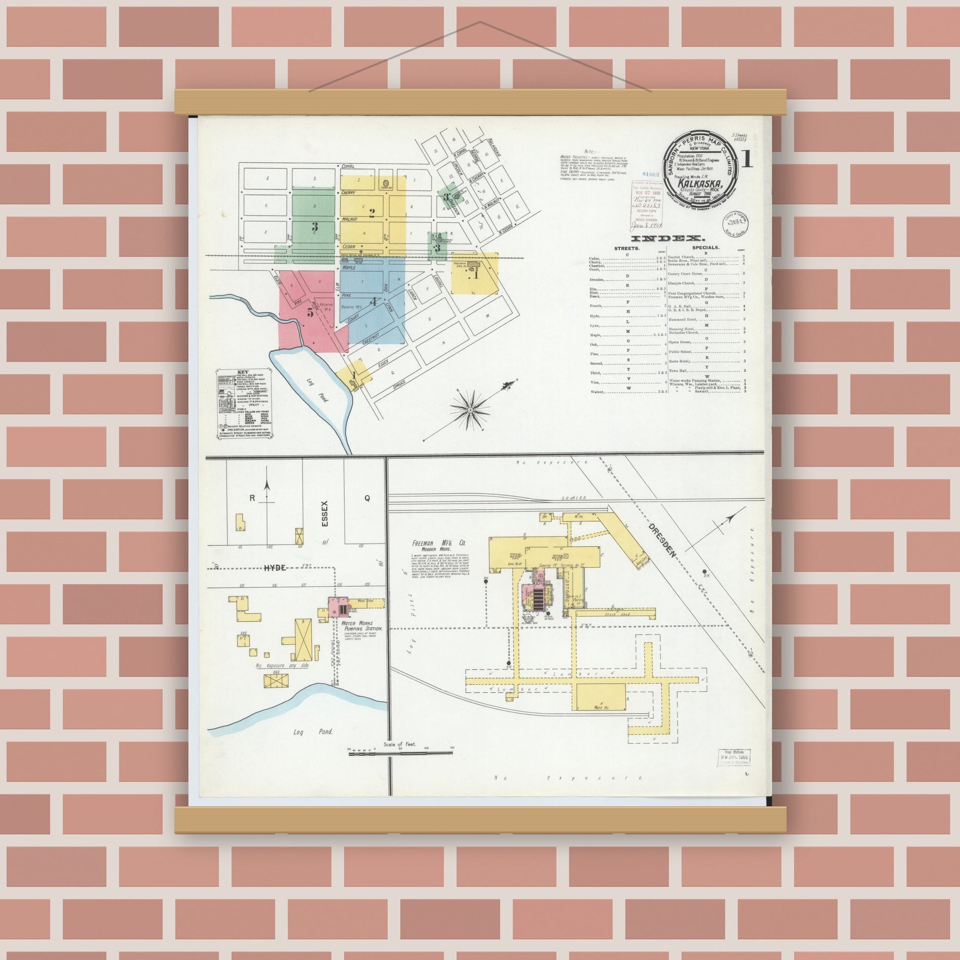 Old map wall art mockup — magnetic wood frame on brick wall — Sanborn Fire Insurance Map from Kalkaska, Kalkaska County, Michigan (1900) - Complete Map Set
