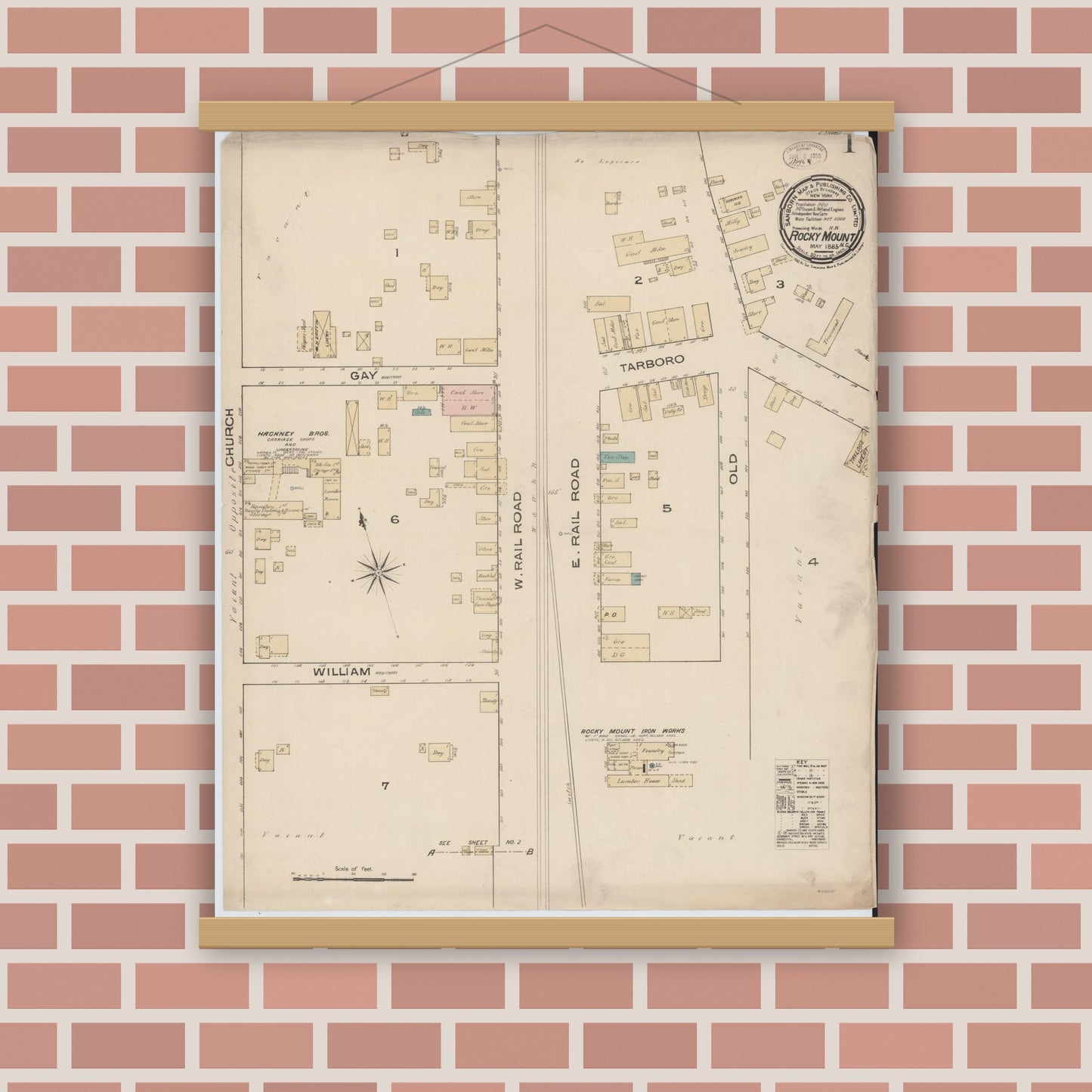 Old map wall art mockup — magnetic wood frame on brick wall — Sanborn Fire Insurance Map from Rocky Mount, Edgecombe And Nash Counties, North Carolina (1885) - Complete Map Set